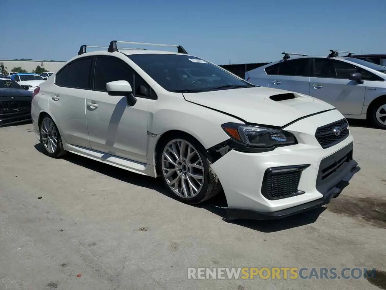 4 fotografías del automóvil dañado JF1VA1A60K9809658 SUBARU WRX 2019