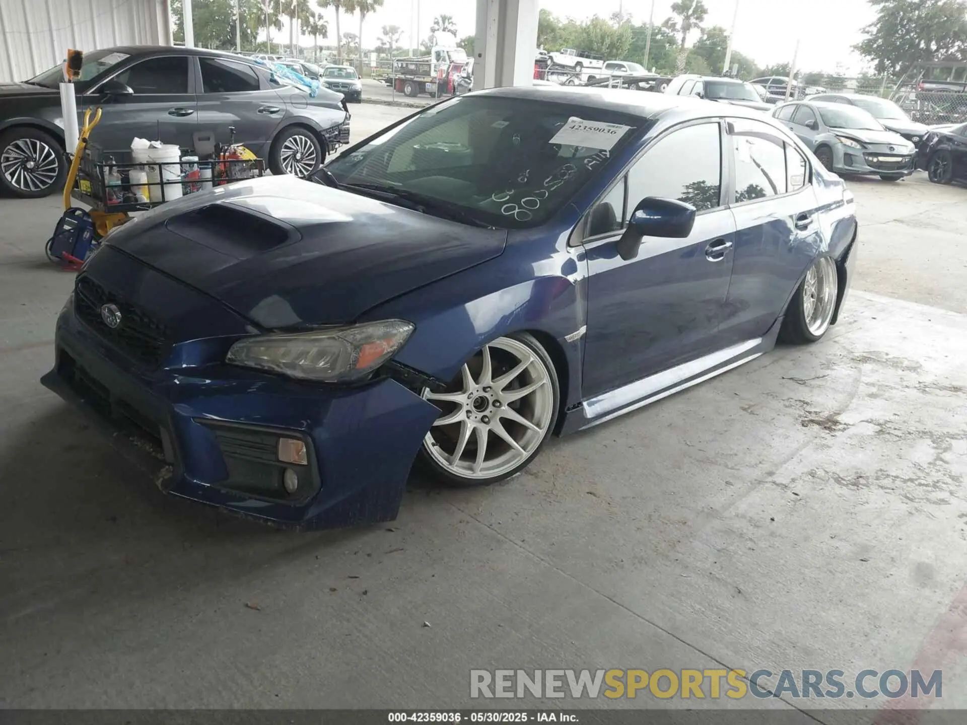 2 fotografías del automóvil dañado JF1VA1C65K9800502 SUBARU WRX 2019
