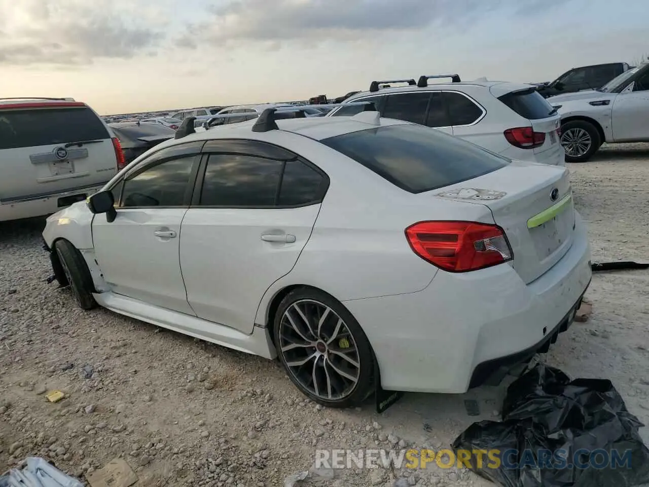 2 fotografías del automóvil dañado JF1VA2E68M9806350 SUBARU WRX 2021