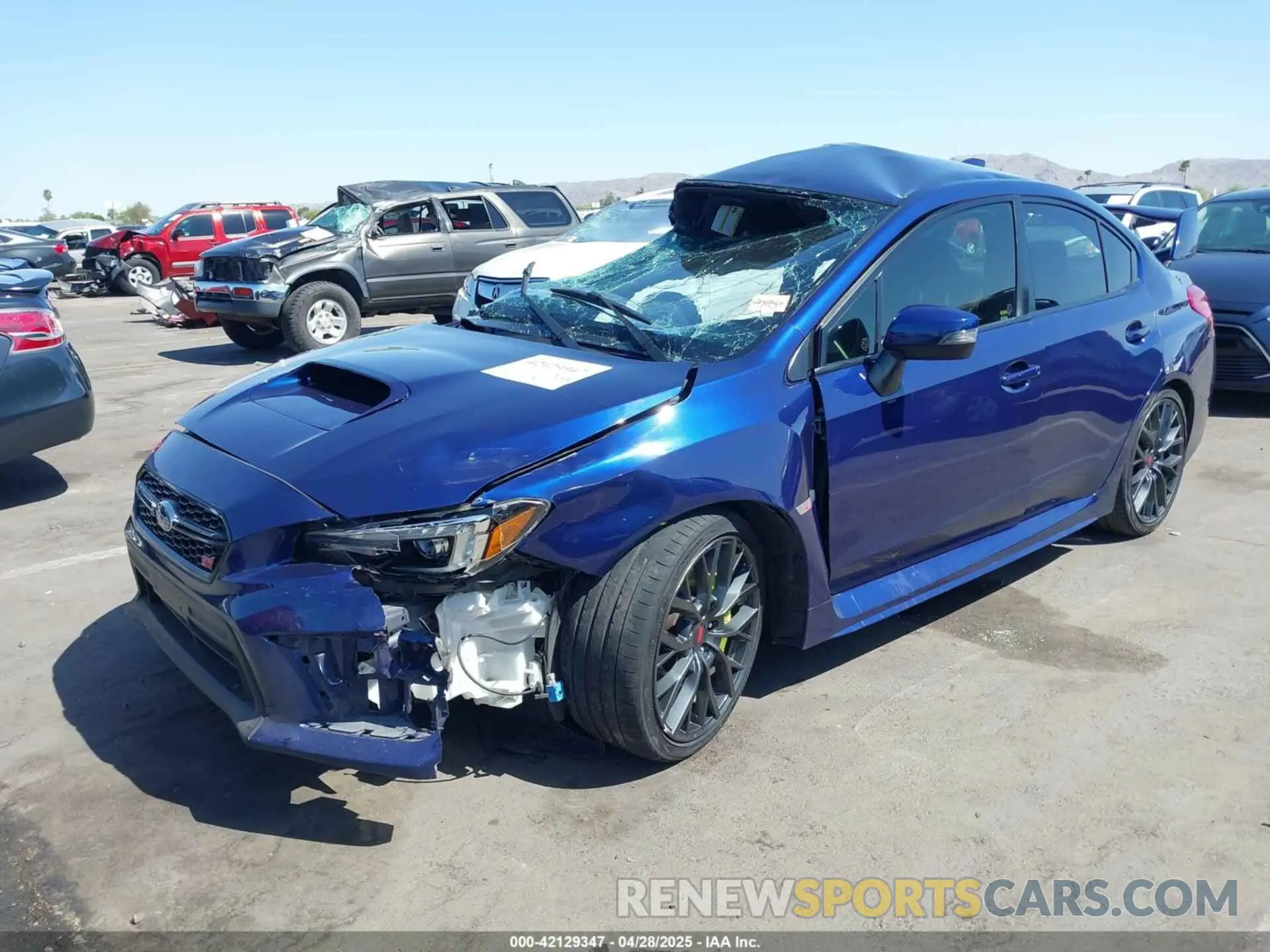 2 fotografías del automóvil dañado JF1VA2S63K9811084 SUBARU WRX STI 2019