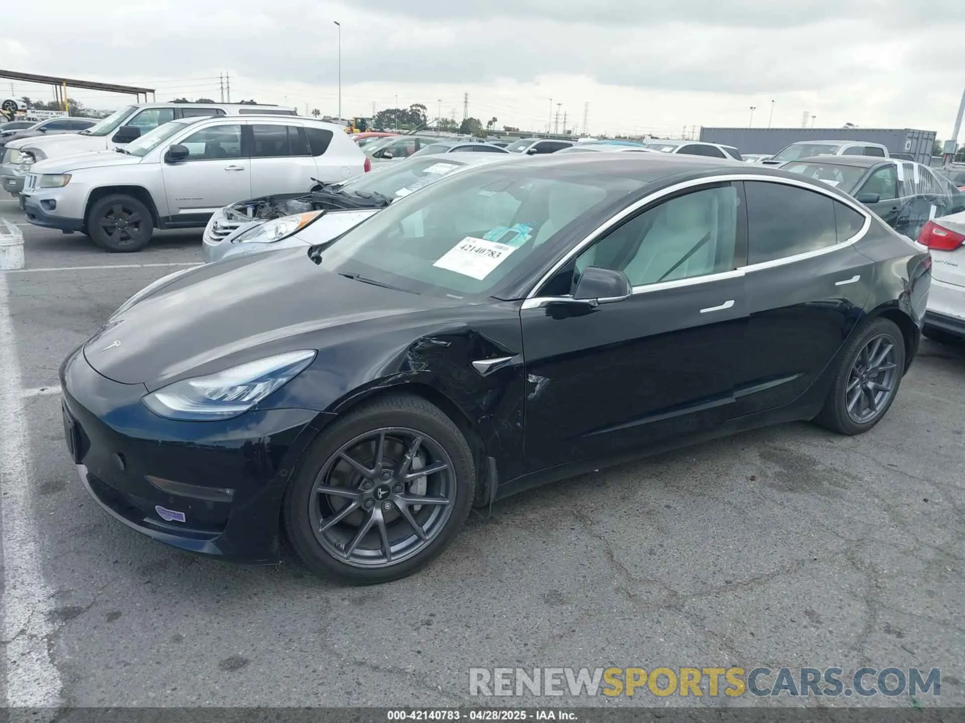 2 fotografías del automóvil dañado 5YJ3E1EA0KF301779 TESLA MODEL 3 2019