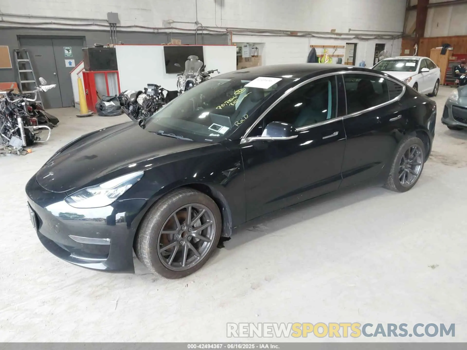 2 fotografías del automóvil dañado 5YJ3E1EA1KF297953 TESLA MODEL 3 2019