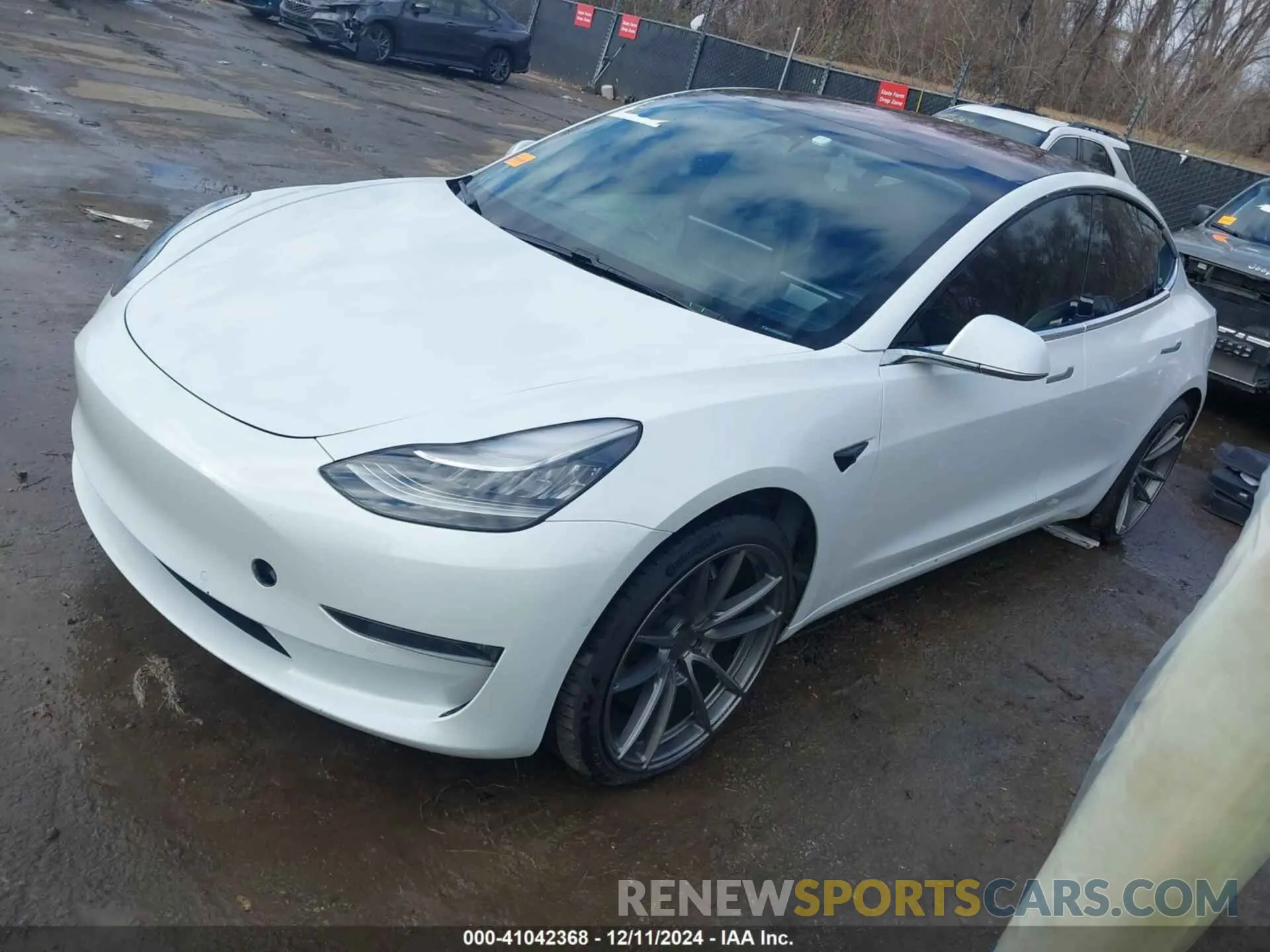 2 fotografías del automóvil dañado 5YJ3E1EA1KF299833 TESLA MODEL 3 2019