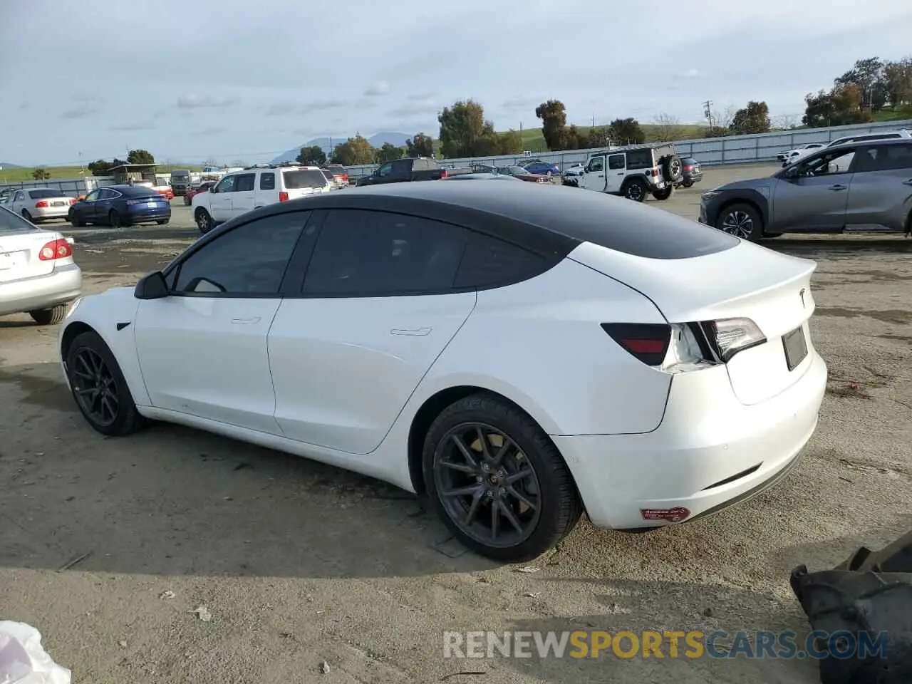 2 fotografías del automóvil dañado 5YJ3E1EA1KF485677 TESLA MODEL 3 2019