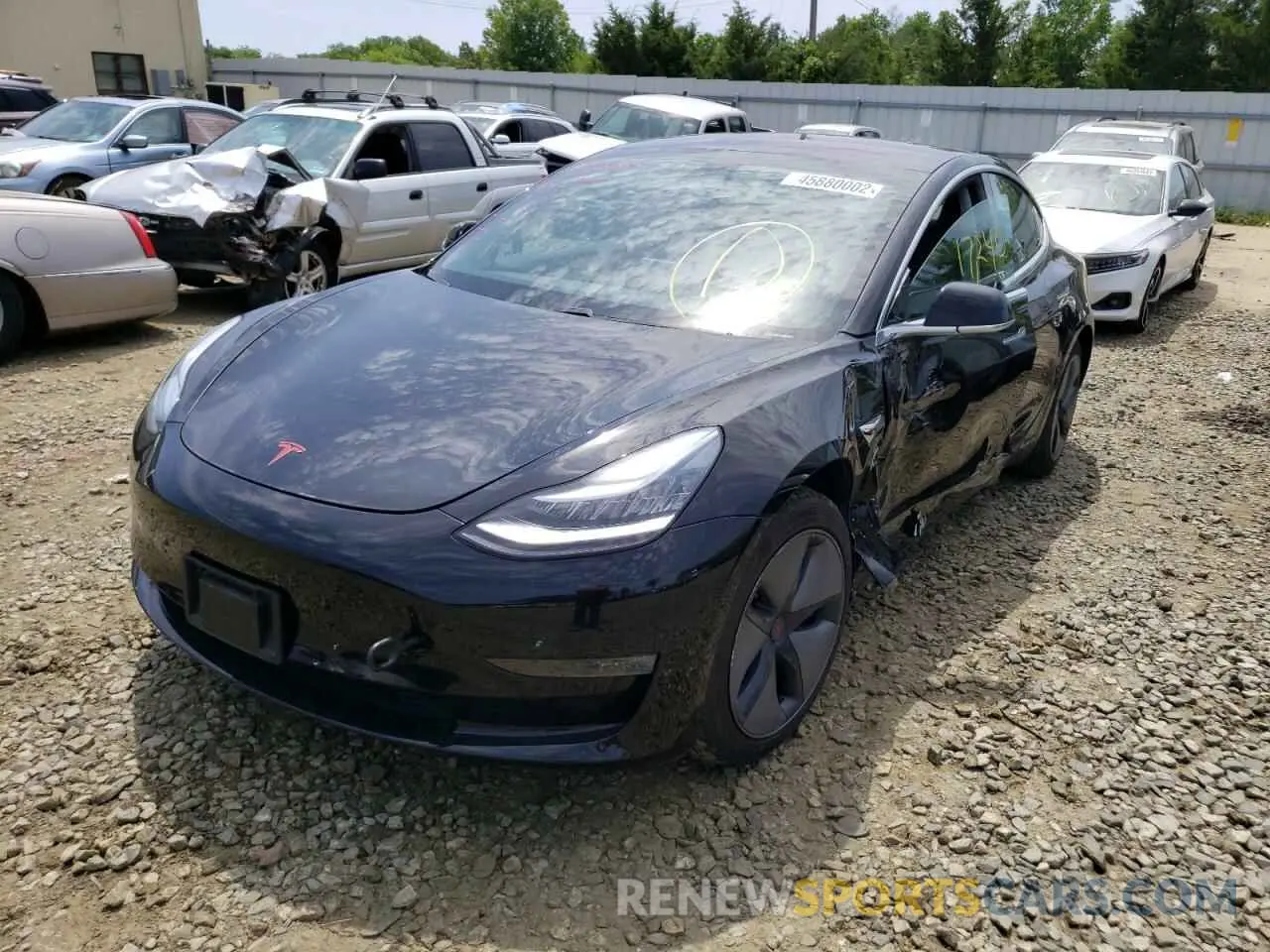 2 fotografías del automóvil dañado 5YJ3E1EA2KF313464 TESLA MODEL 3 2019