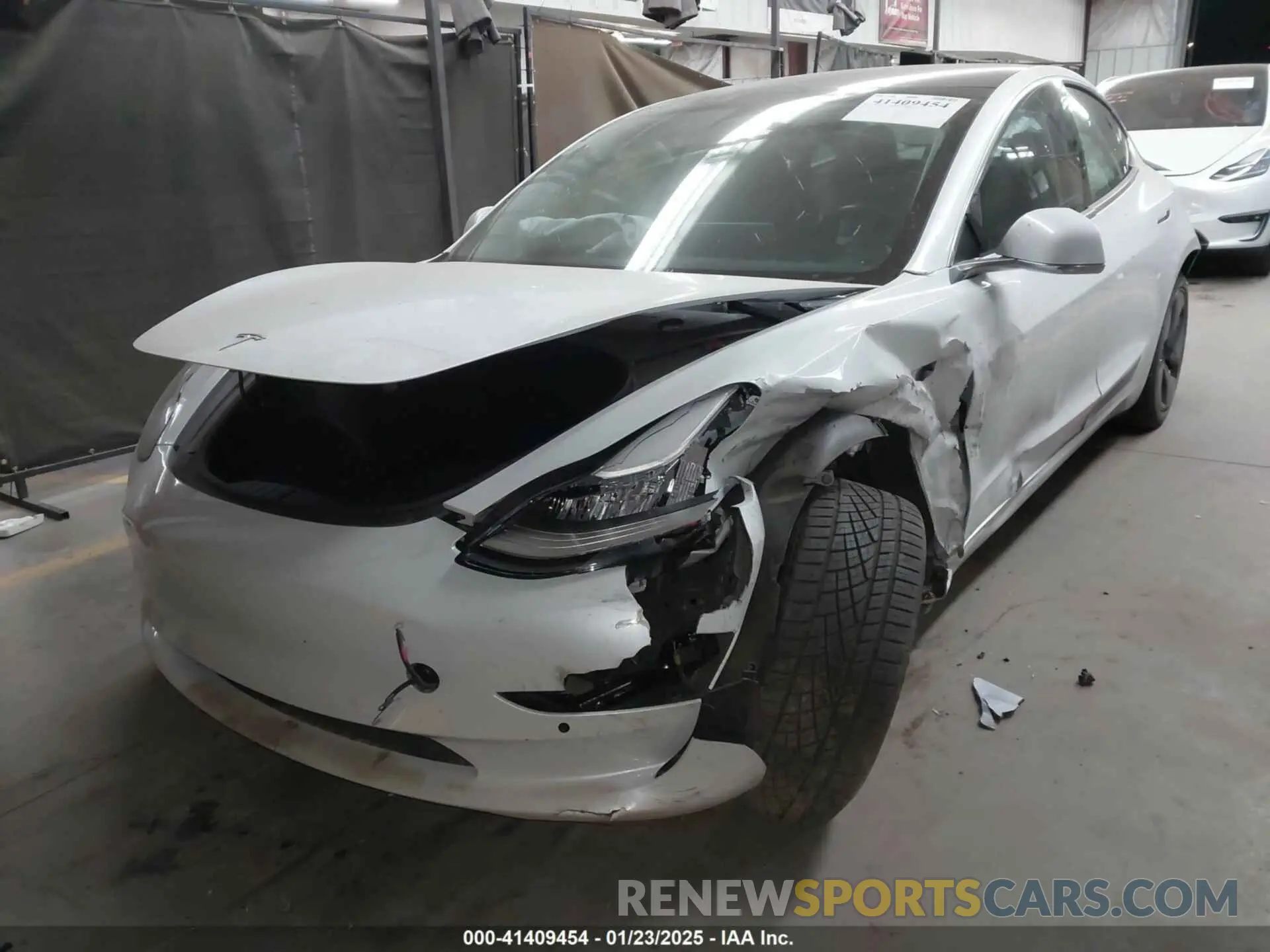 2 fotografías del automóvil dañado 5YJ3E1EA2KF317529 TESLA MODEL 3 2019