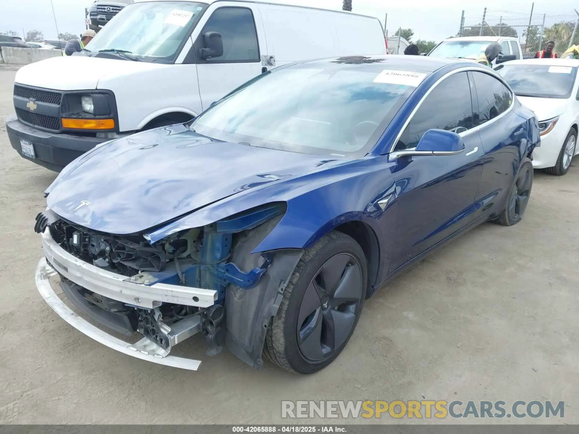 2 fotografías del automóvil dañado 5YJ3E1EA2KF326103 TESLA MODEL 3 2019