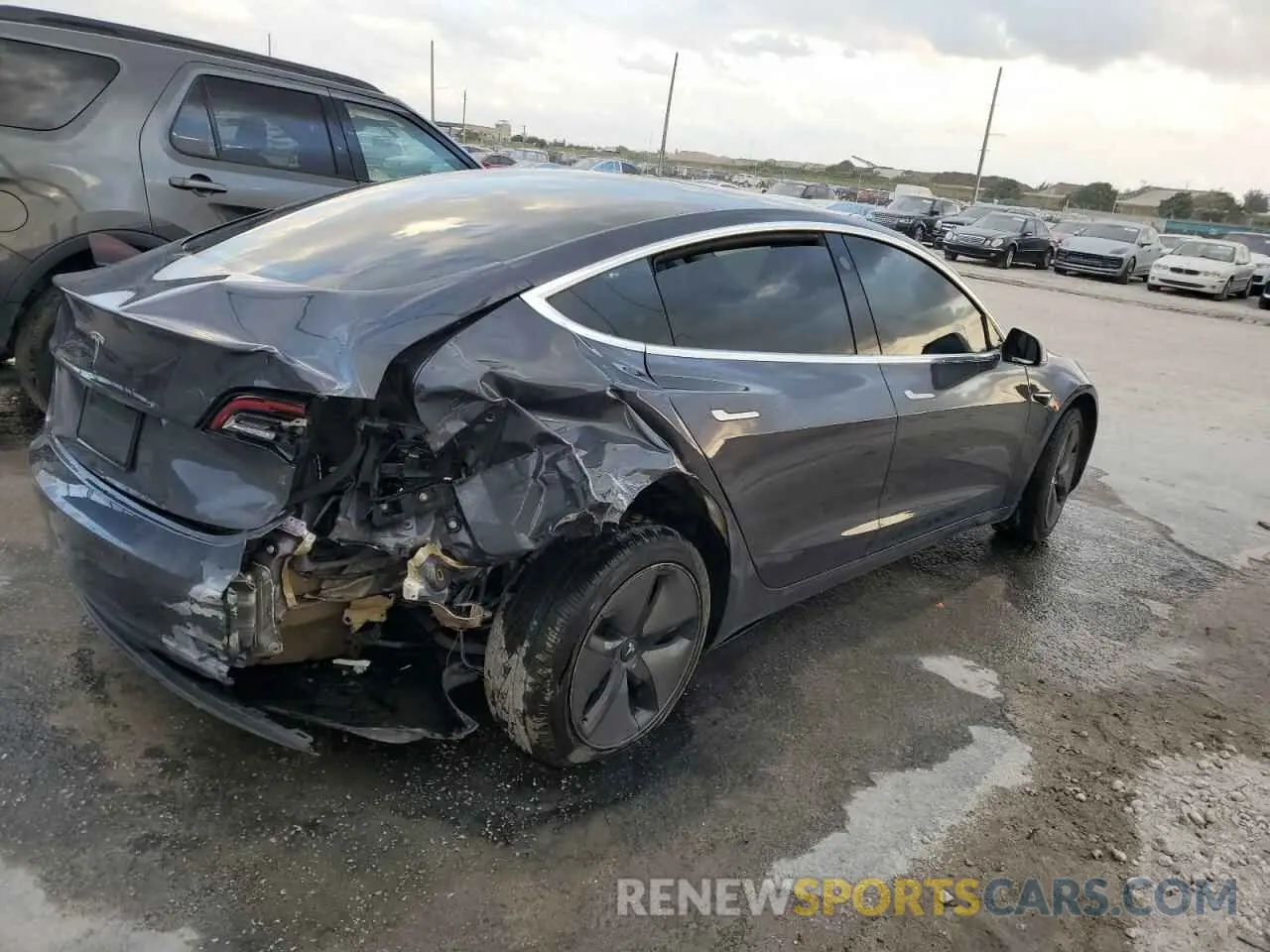 3 fotografías del automóvil dañado 5YJ3E1EA2KF362406 TESLA MODEL 3 2019