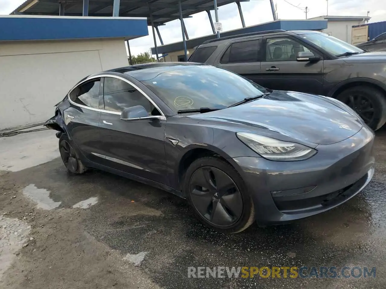 4 fotografías del automóvil dañado 5YJ3E1EA2KF362406 TESLA MODEL 3 2019