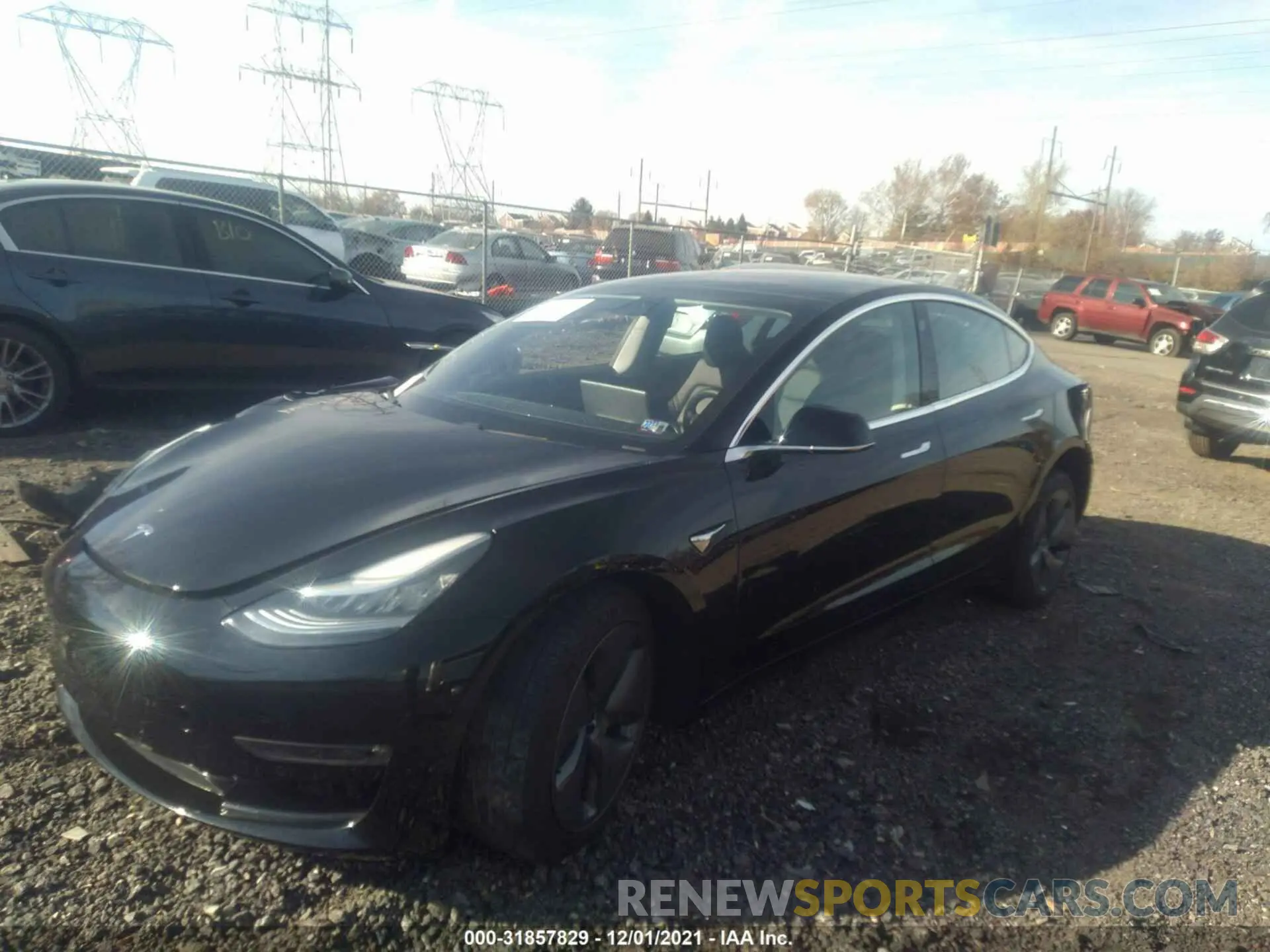 2 fotografías del automóvil dañado 5YJ3E1EA2KF396054 TESLA MODEL 3 2019