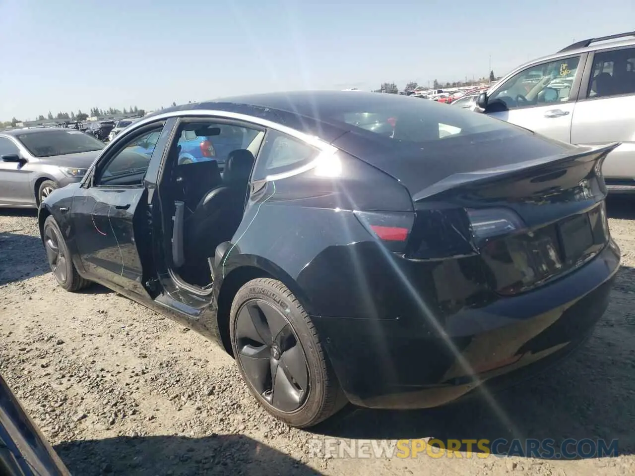 2 fotografías del automóvil dañado 5YJ3E1EA2KF398841 TESLA MODEL 3 2019