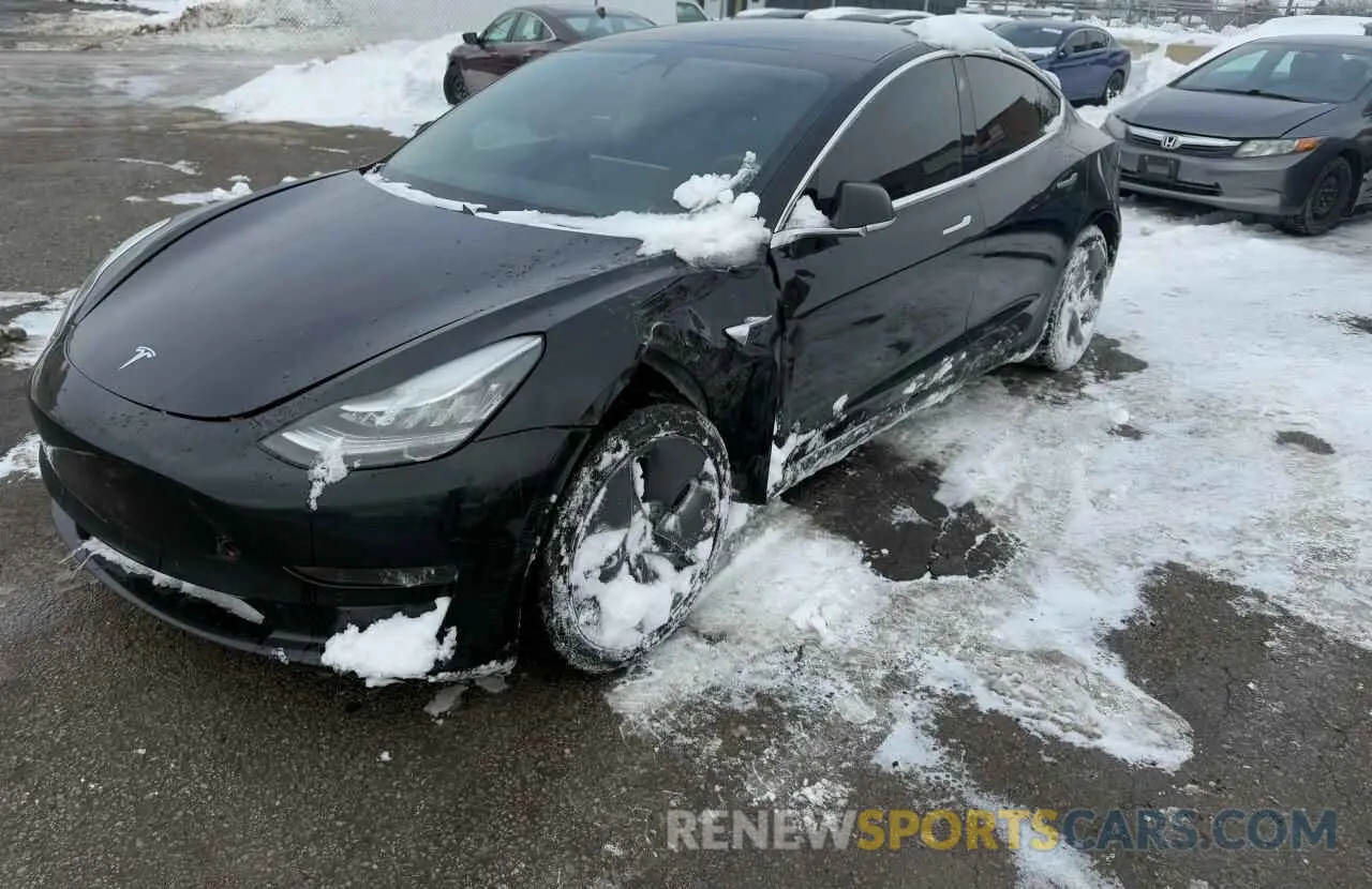 2 fotografías del automóvil dañado 5YJ3E1EA2KF410437 TESLA MODEL 3 2019