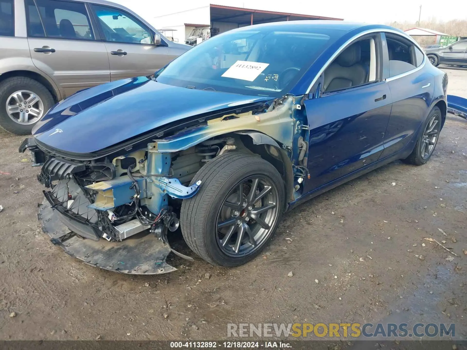 2 fotografías del automóvil dañado 5YJ3E1EA2KF411846 TESLA MODEL 3 2019