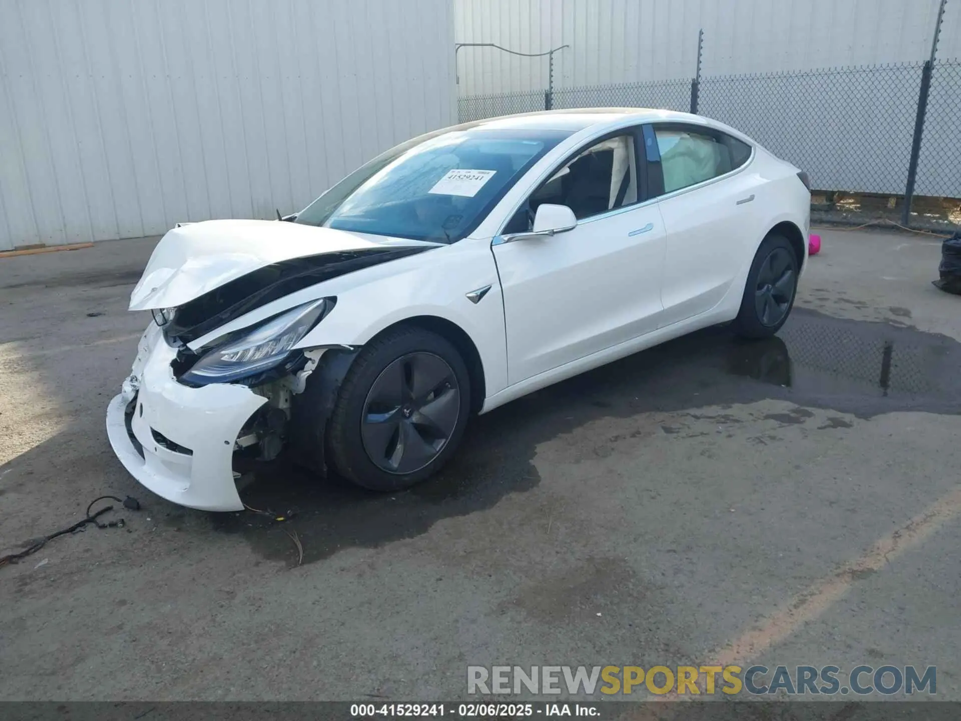 2 fotografías del automóvil dañado 5YJ3E1EA2KF412169 TESLA MODEL 3 2019