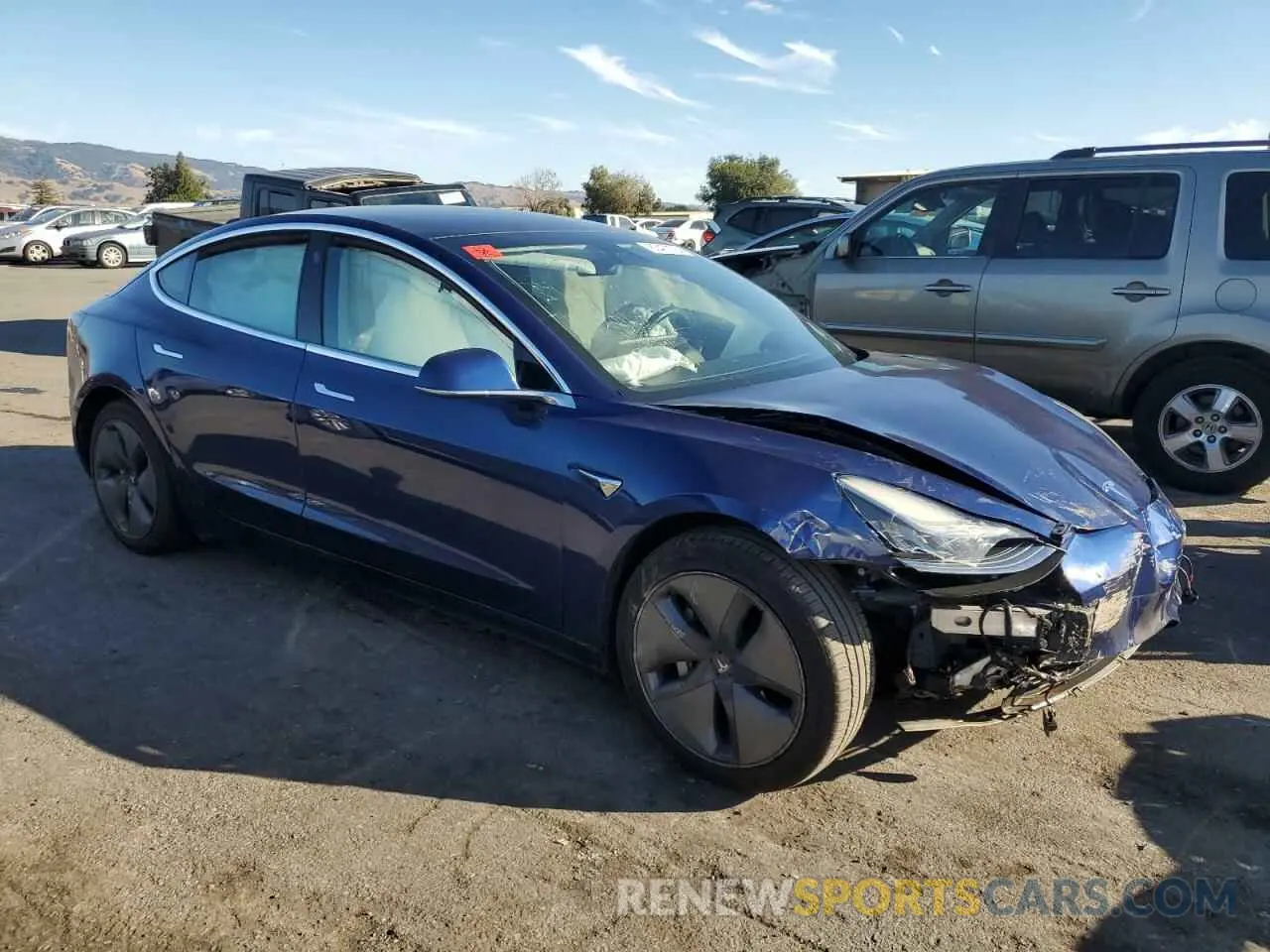4 fotografías del automóvil dañado 5YJ3E1EA2KF421261 TESLA MODEL 3 2019