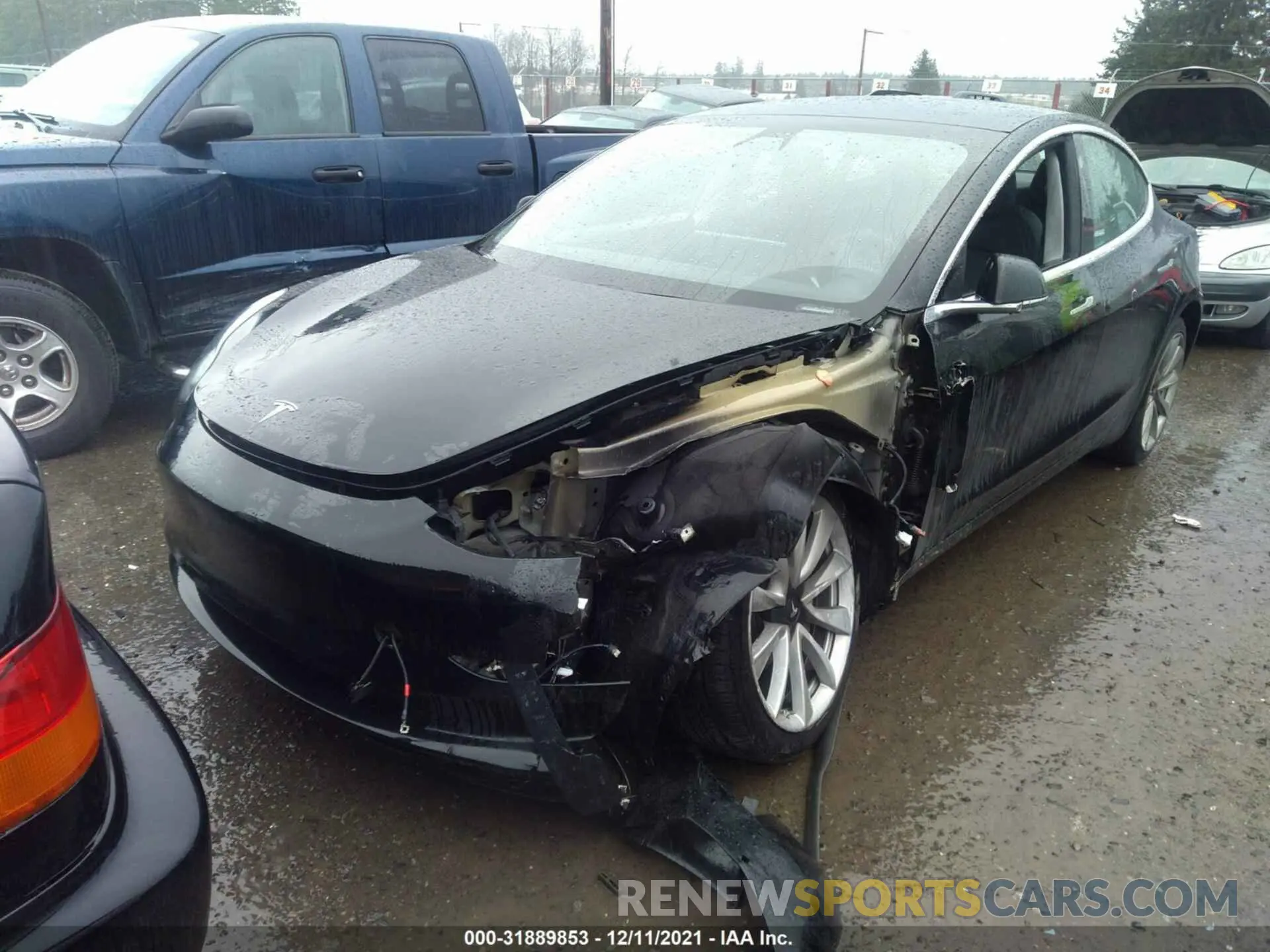 2 fotografías del automóvil dañado 5YJ3E1EA2KF434575 TESLA MODEL 3 2019