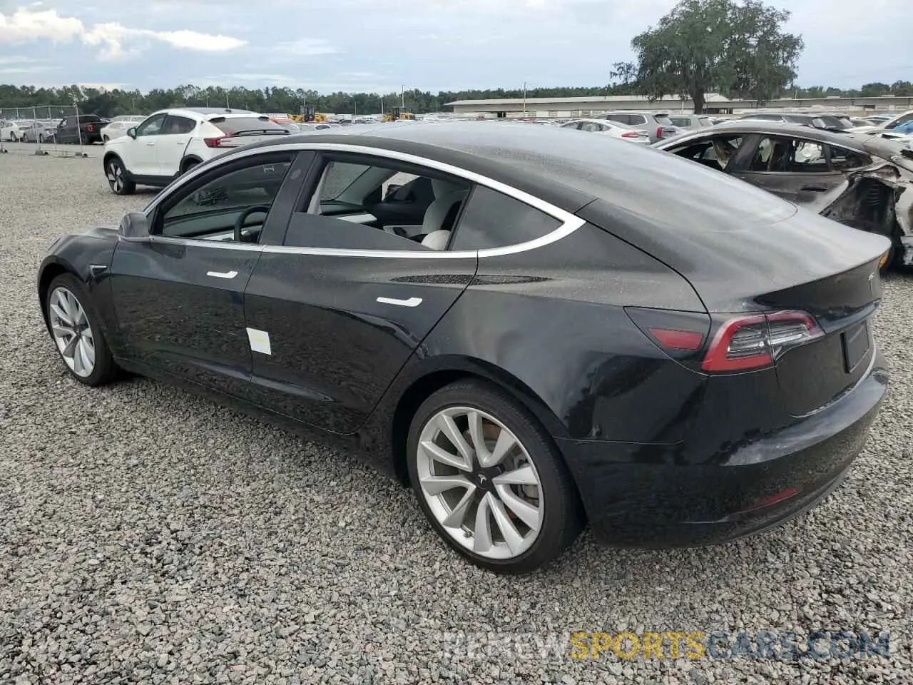 2 fotografías del automóvil dañado 5YJ3E1EA2KF445219 TESLA MODEL 3 2019