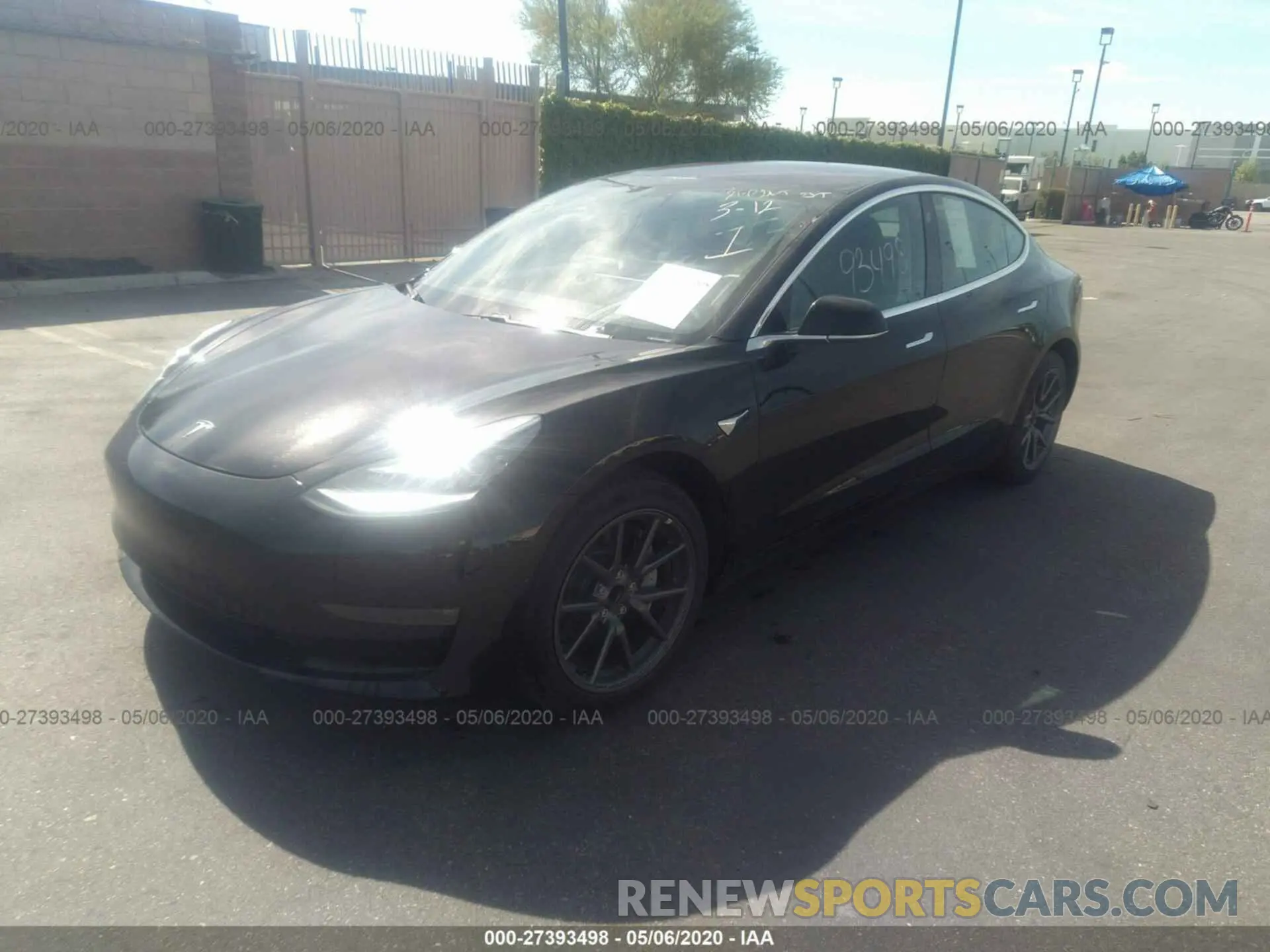 2 fotografías del automóvil dañado 5YJ3E1EA3KF313490 TESLA MODEL 3 2019