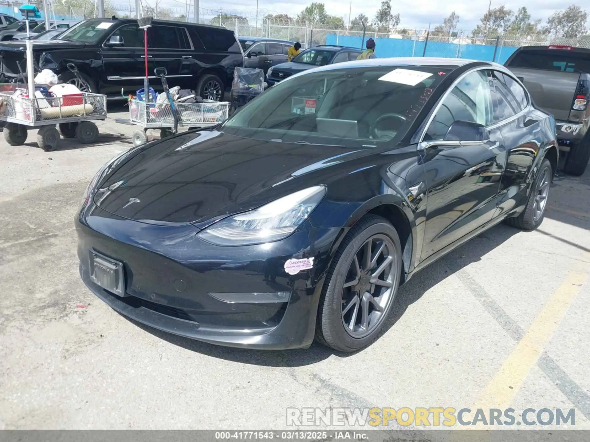2 fotografías del automóvil dañado 5YJ3E1EA3KF325056 TESLA MODEL 3 2019