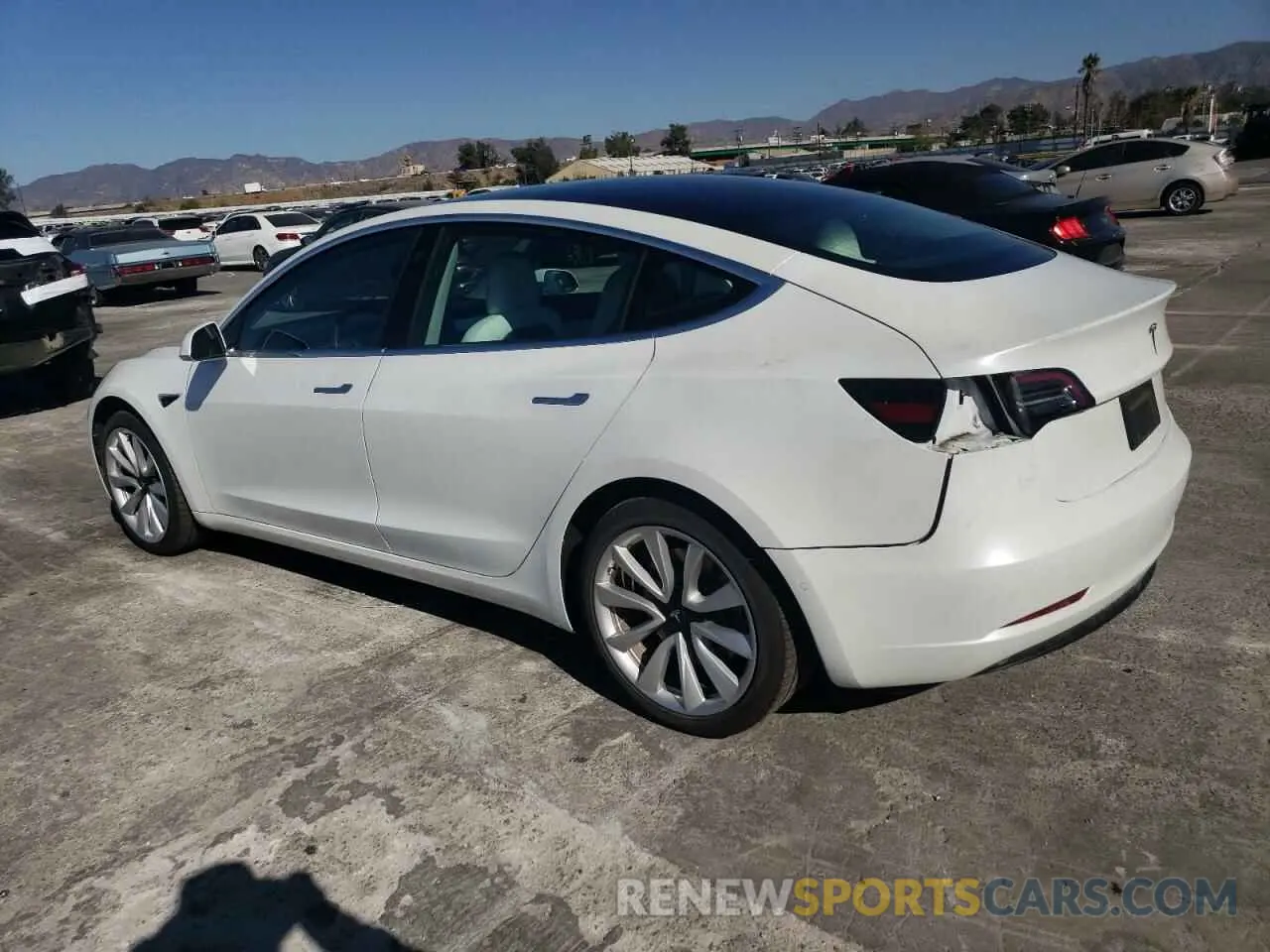 2 fotografías del automóvil dañado 5YJ3E1EA3KF448002 TESLA MODEL 3 2019