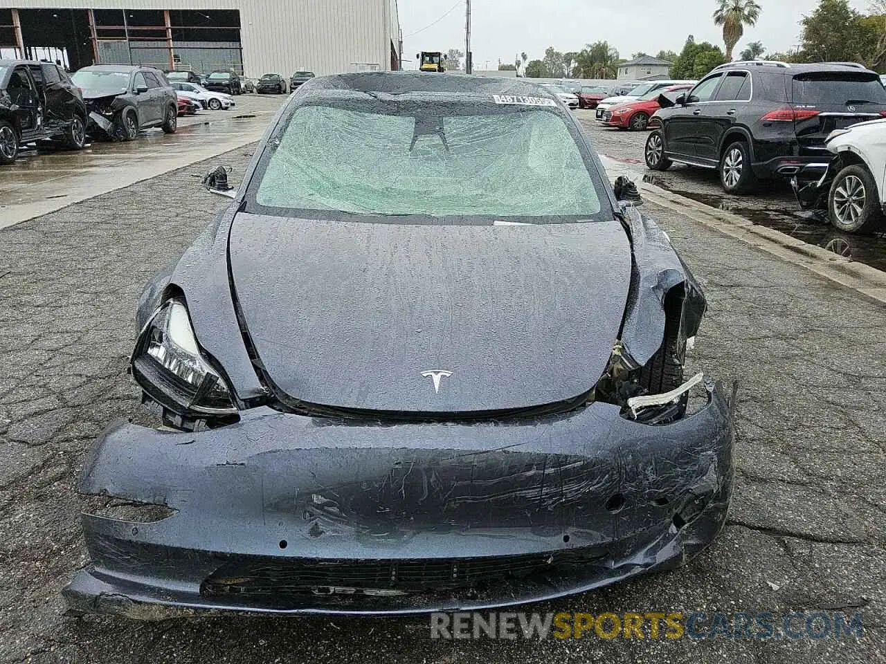 5 fotografías del automóvil dañado 5YJ3E1EA4KF407409 TESLA MODEL 3 2019