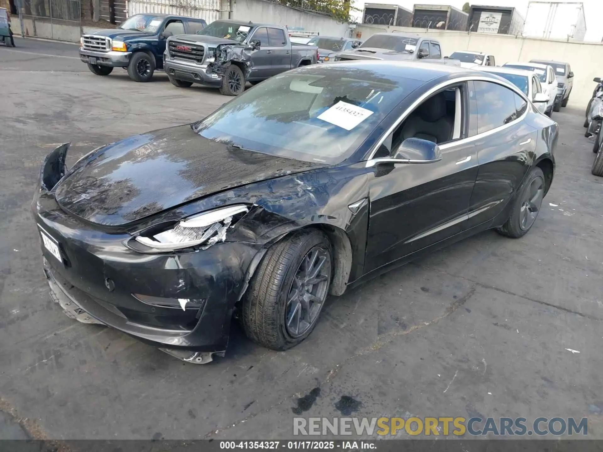 2 fotografías del automóvil dañado 5YJ3E1EA4KF426705 TESLA MODEL 3 2019