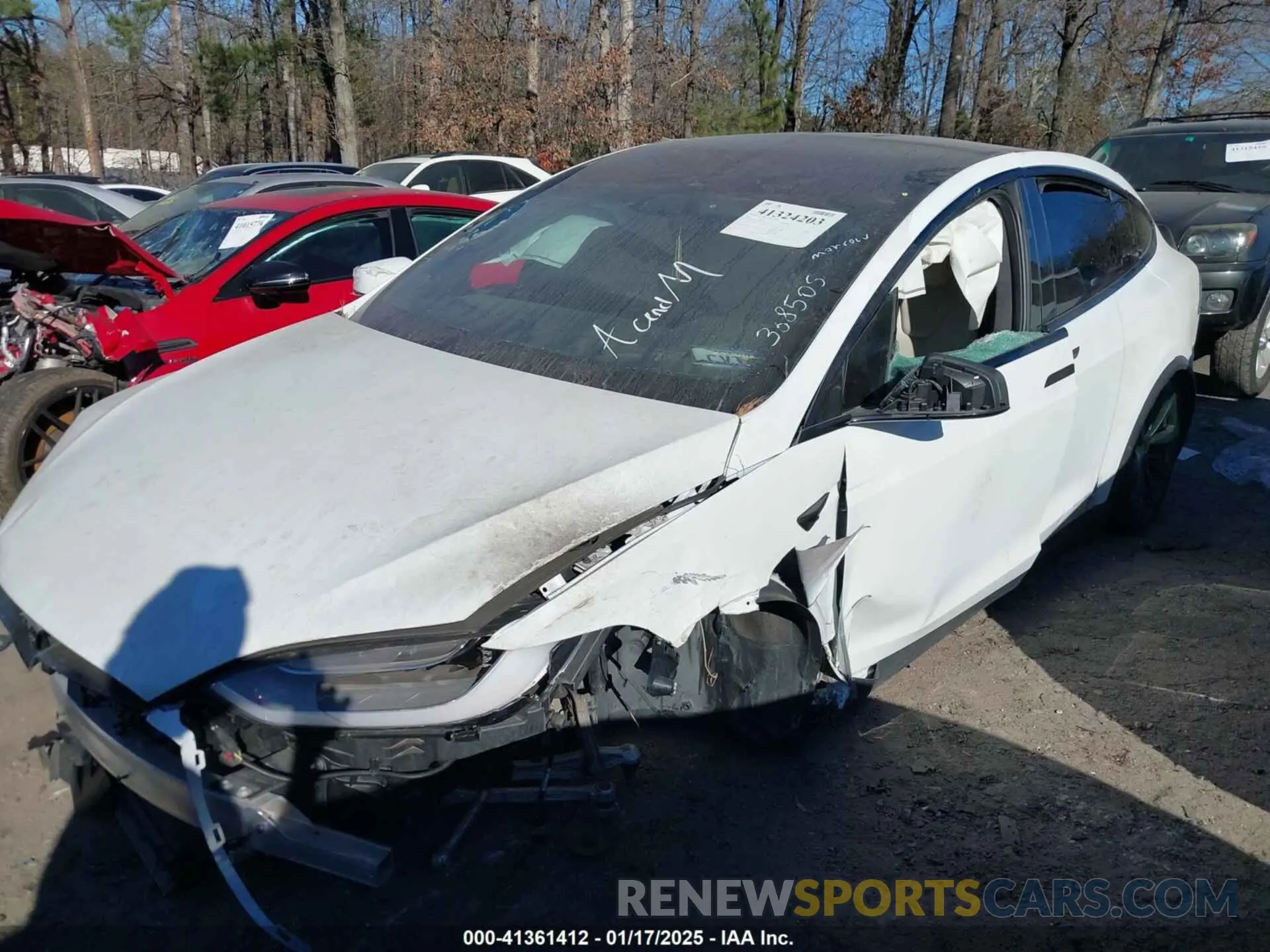 2 fotografías del automóvil dañado 5YJ3E1EA5KF297213 TESLA MODEL 3 2019