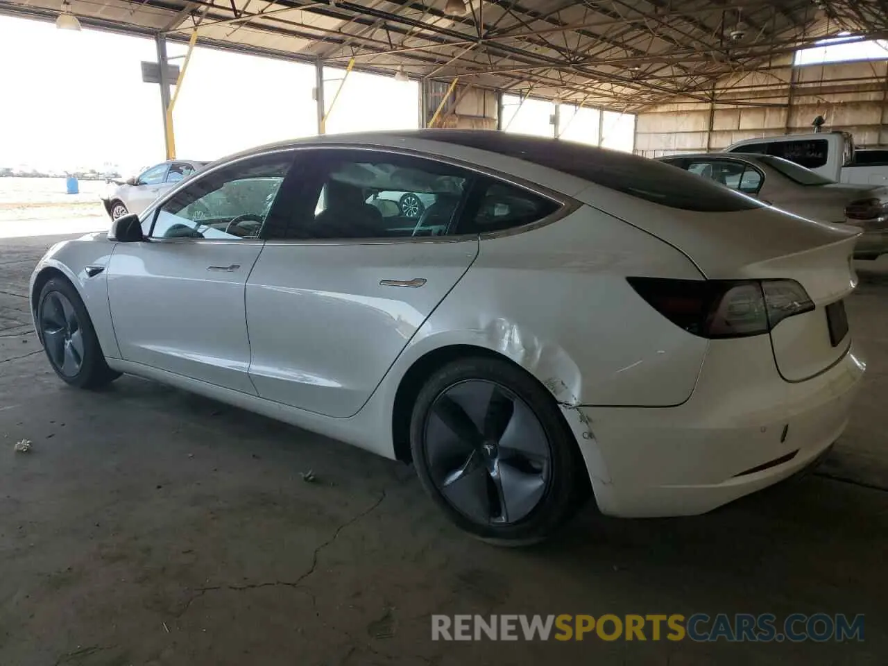 2 fotografías del automóvil dañado 5YJ3E1EA5KF310252 TESLA MODEL 3 2019