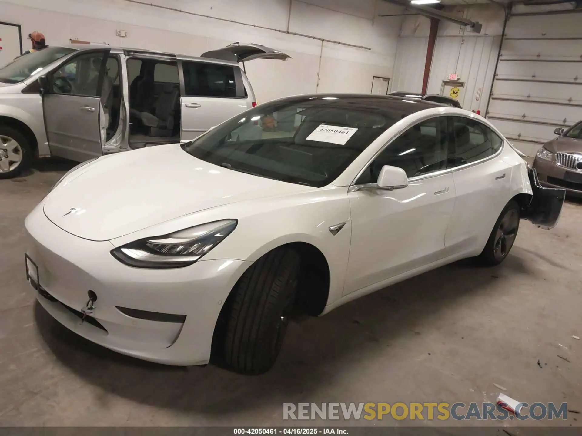 2 fotografías del automóvil dañado 5YJ3E1EA5KF317542 TESLA MODEL 3 2019