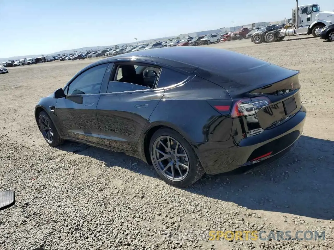2 fotografías del automóvil dañado 5YJ3E1EA5KF395660 TESLA MODEL 3 2019