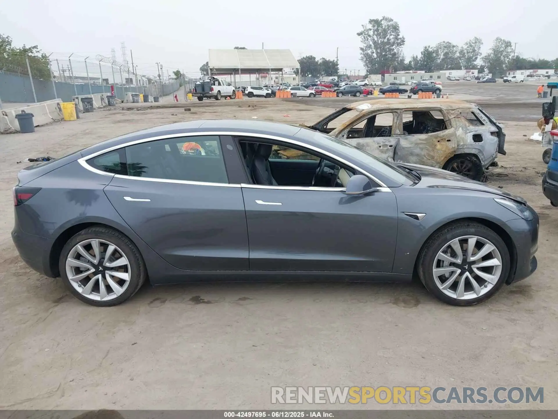 12 fotografías del automóvil dañado 5YJ3E1EA5KF412599 TESLA MODEL 3 2019