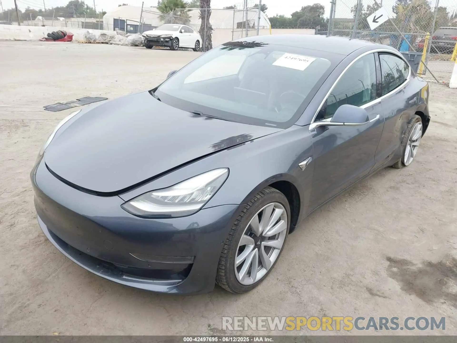 2 fotografías del automóvil dañado 5YJ3E1EA5KF412599 TESLA MODEL 3 2019