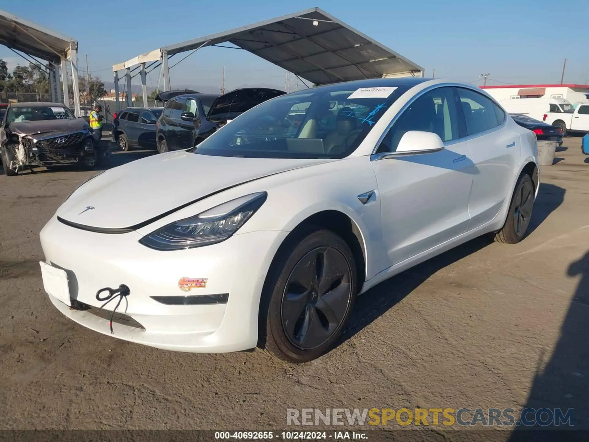 2 fotografías del automóvil dañado 5YJ3E1EA6KF485190 TESLA MODEL 3 2019