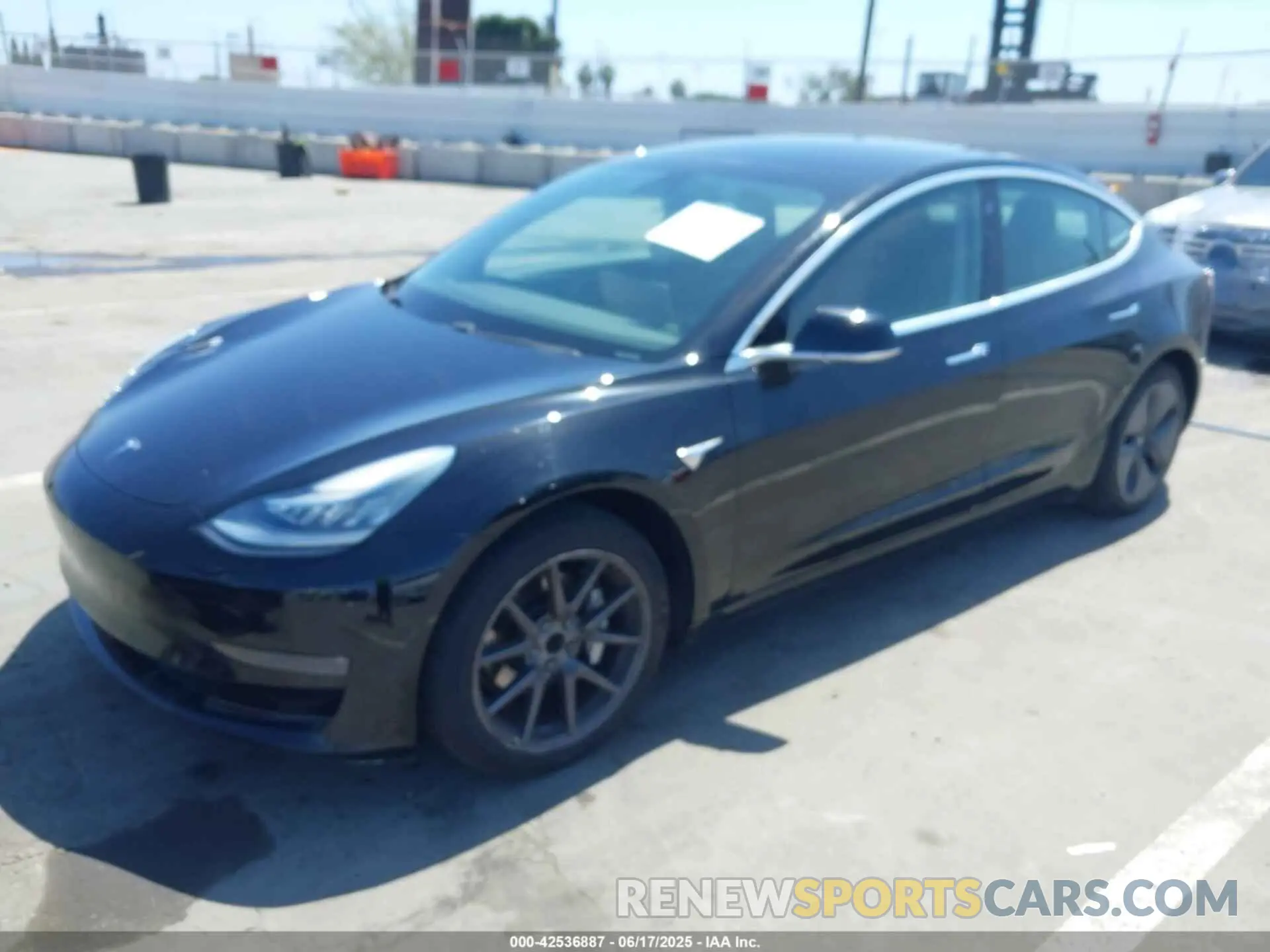 2 fotografías del automóvil dañado 5YJ3E1EA7KF306638 TESLA MODEL 3 2019