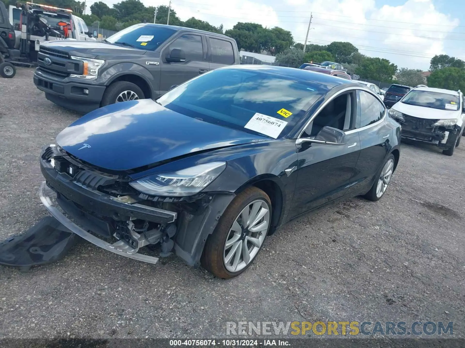 2 fotografías del automóvil dañado 5YJ3E1EA7KF324380 TESLA MODEL 3 2019