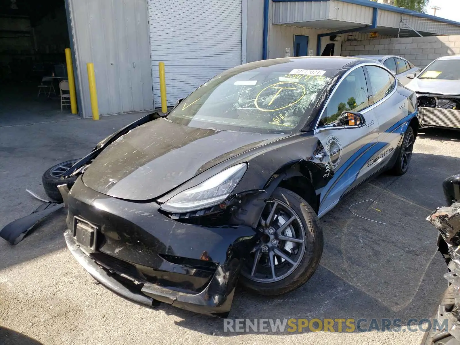 2 fotografías del automóvil dañado 5YJ3E1EA7KF394574 TESLA MODEL 3 2019
