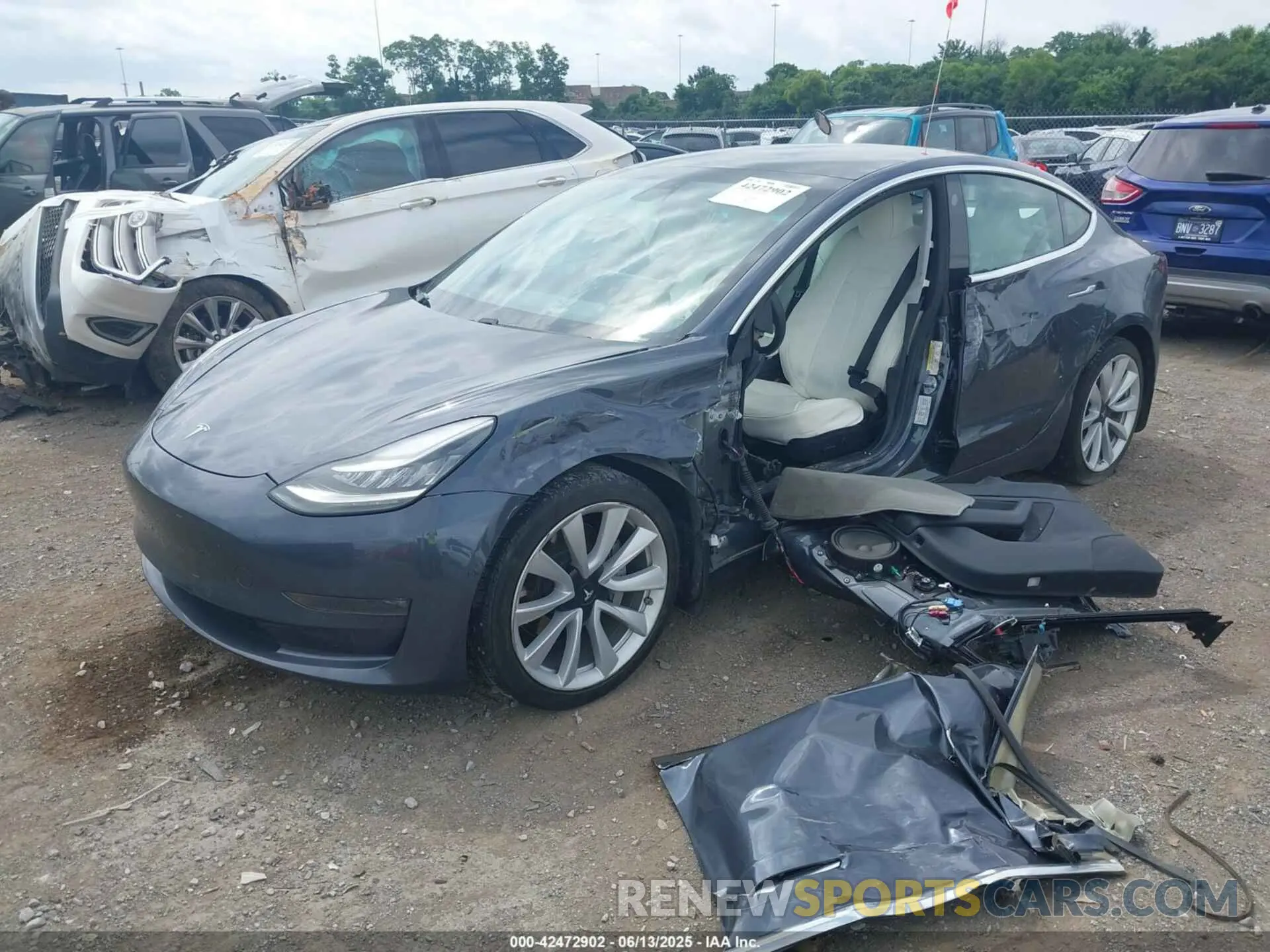2 fotografías del automóvil dañado 5YJ3E1EA7KF529830 TESLA MODEL 3 2019