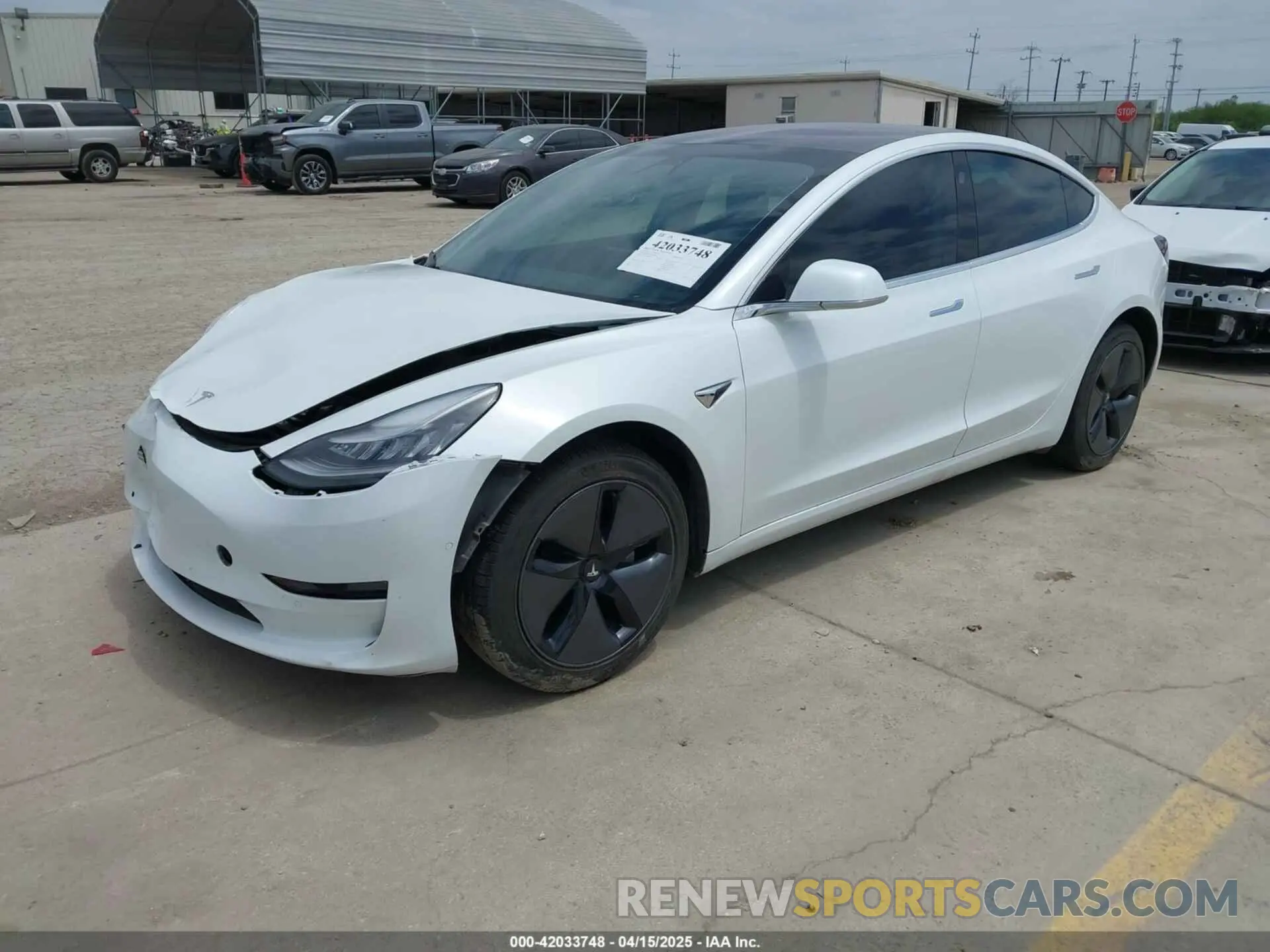 2 fotografías del automóvil dañado 5YJ3E1EA8KF299991 TESLA MODEL 3 2019