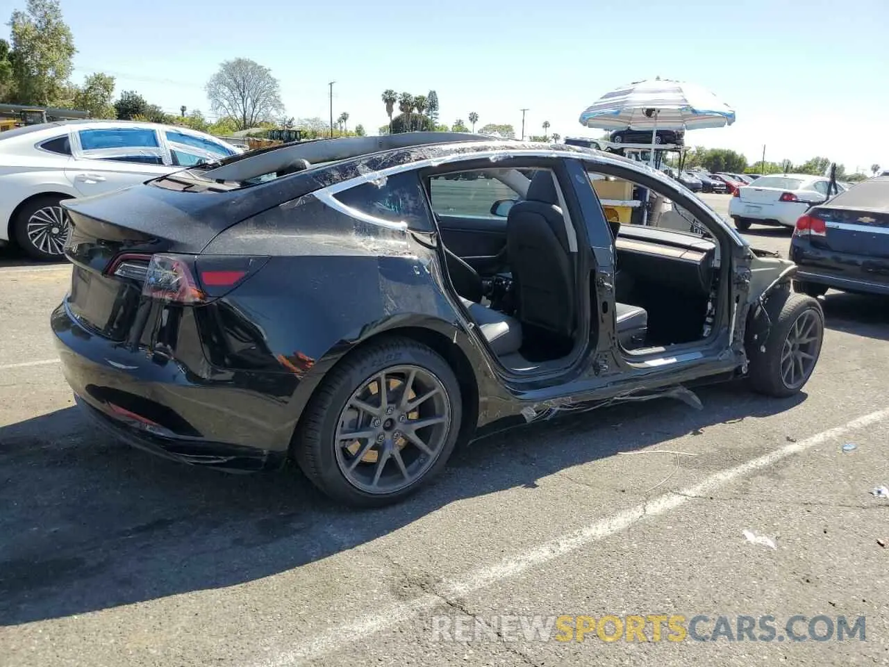 3 fotografías del automóvil dañado 5YJ3E1EA8KF306096 TESLA MODEL 3 2019