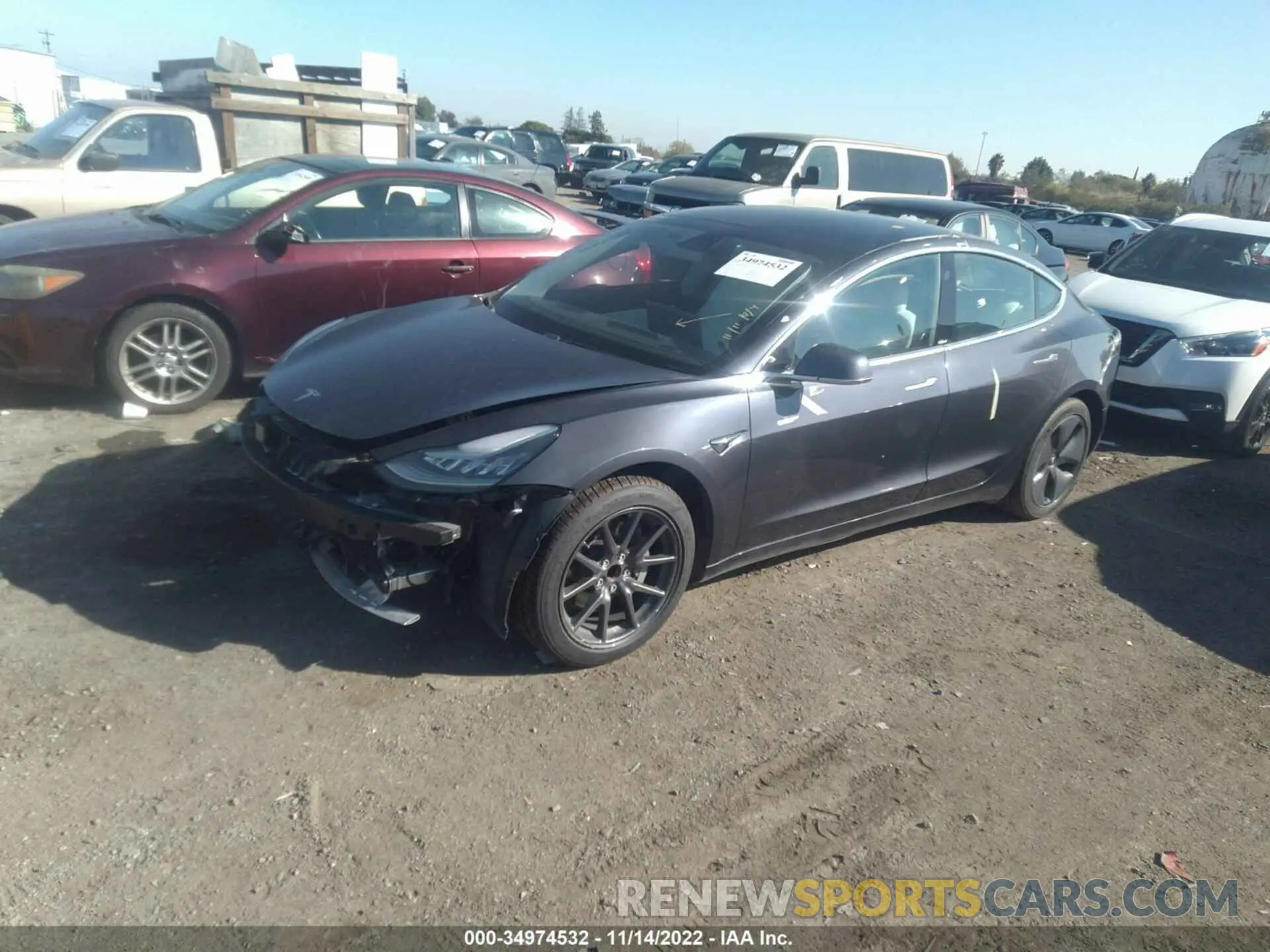 2 fotografías del automóvil dañado 5YJ3E1EA8KF323576 TESLA MODEL 3 2019