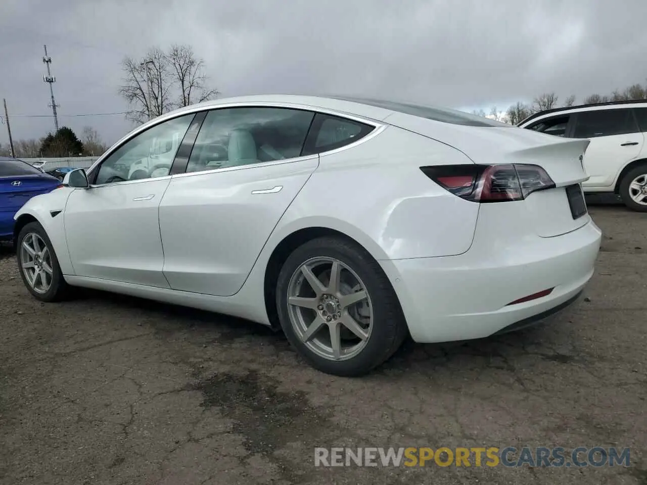 2 fotografías del automóvil dañado 5YJ3E1EA8KF429400 TESLA MODEL 3 2019