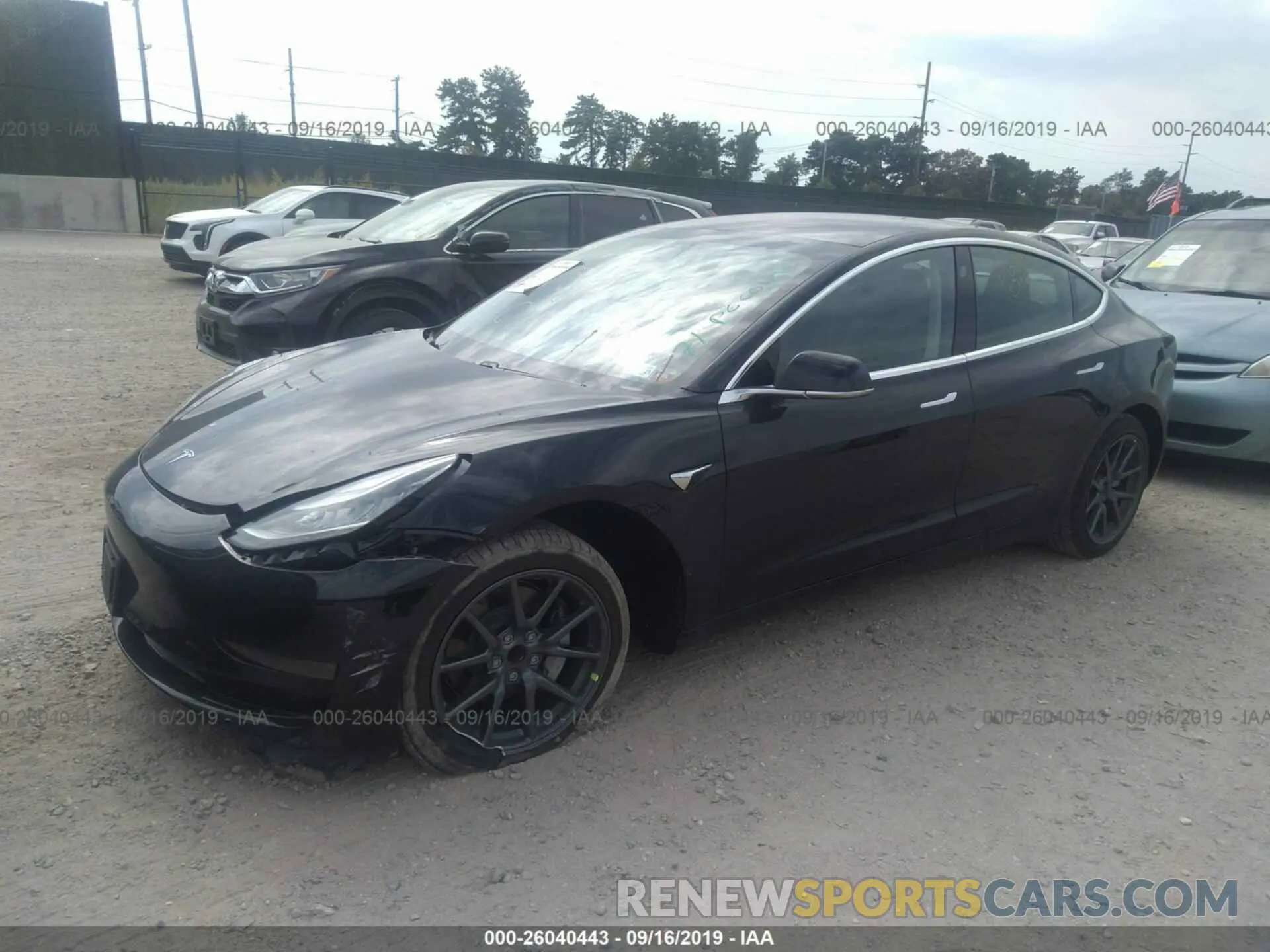 2 fotografías del automóvil dañado 5YJ3E1EA9KF297909 TESLA MODEL 3 2019