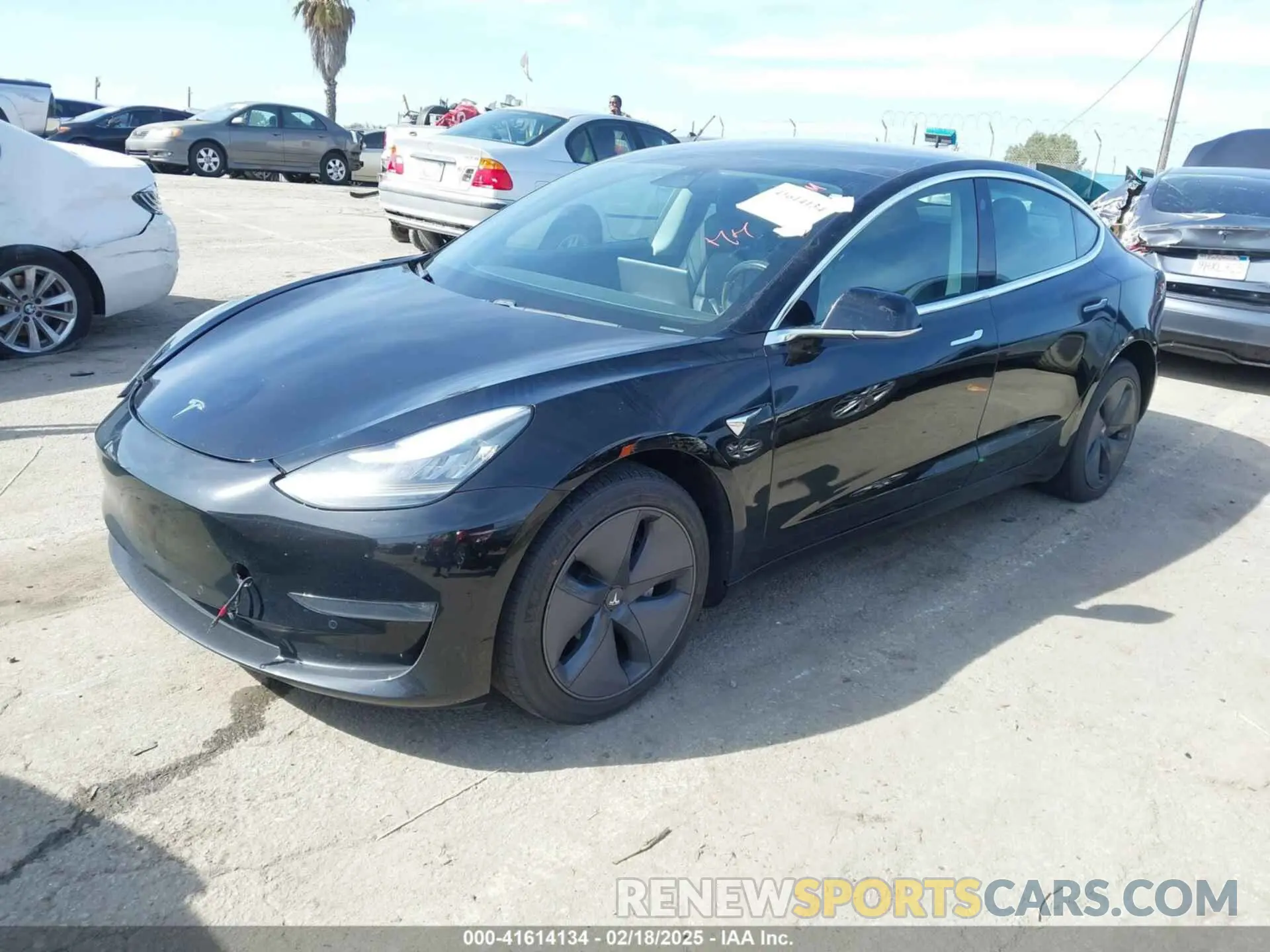 2 fotografías del automóvil dañado 5YJ3E1EA9KF410869 TESLA MODEL 3 2019