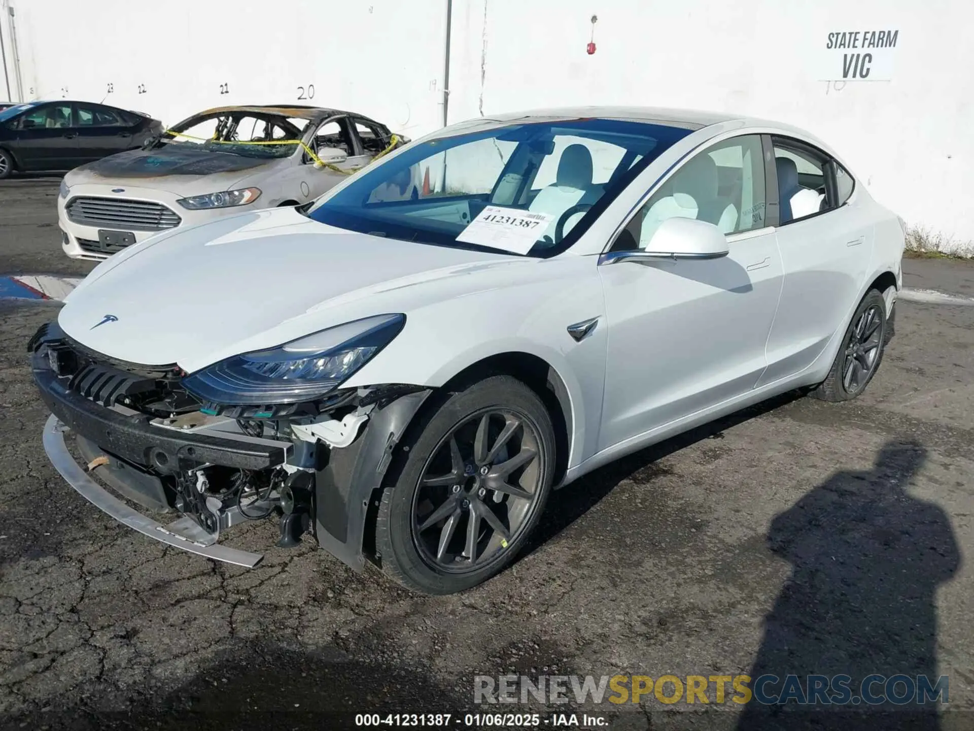 2 fotografías del automóvil dañado 5YJ3E1EA9KF431821 TESLA MODEL 3 2019