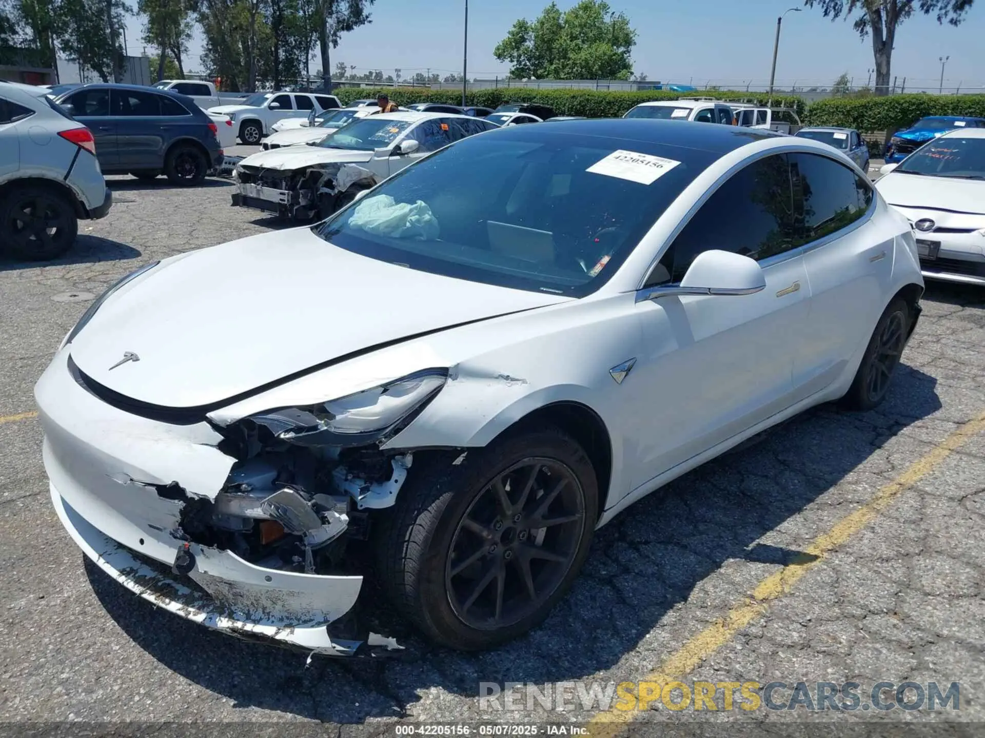2 fotografías del automóvil dañado 5YJ3E1EA9KF485278 TESLA MODEL 3 2019
