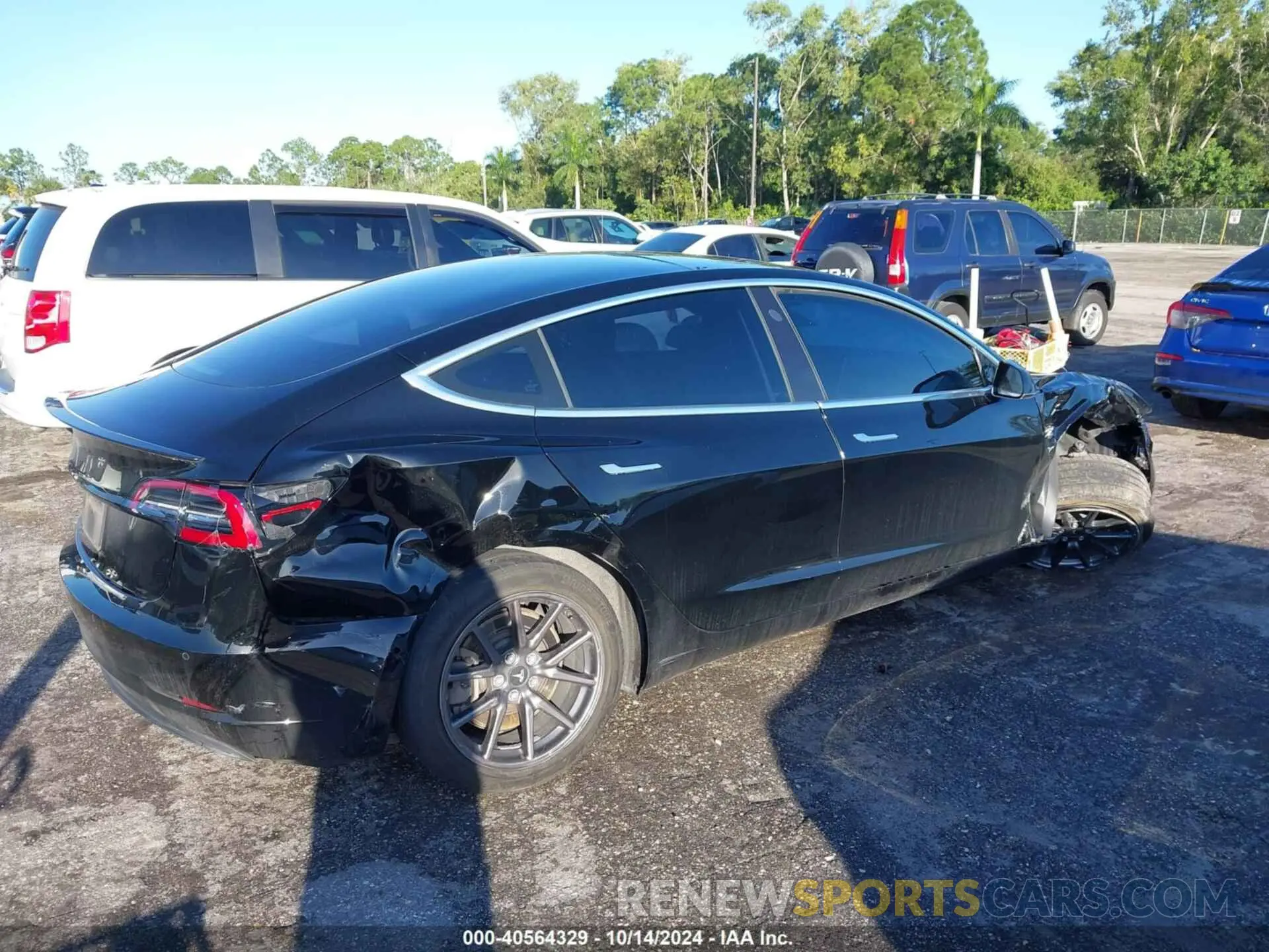 4 fotografías del automóvil dañado 5YJ3E1EAXKF325409 TESLA MODEL 3 2019