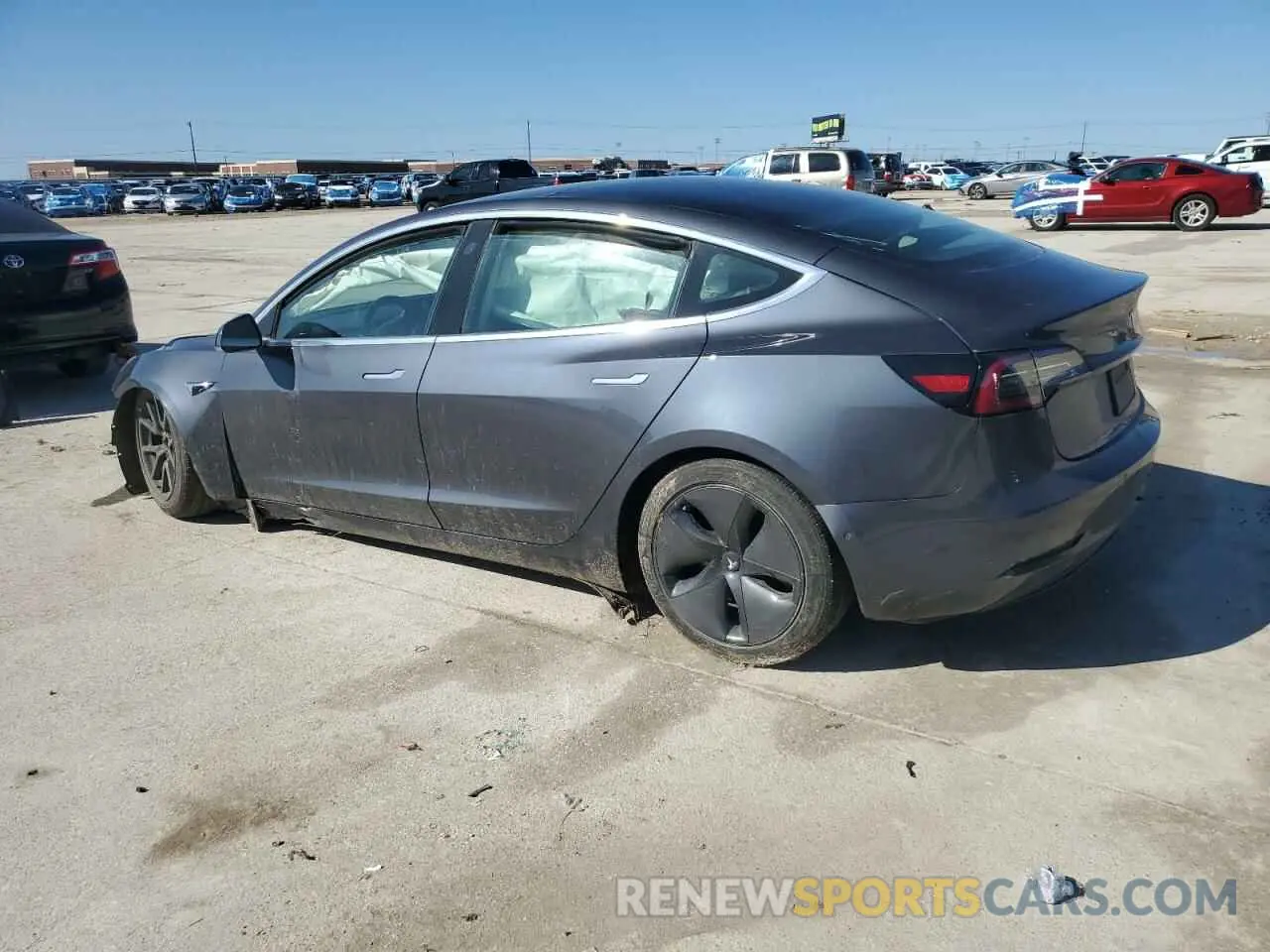 2 fotografías del automóvil dañado 5YJ3E1EAXKF325507 TESLA MODEL 3 2019