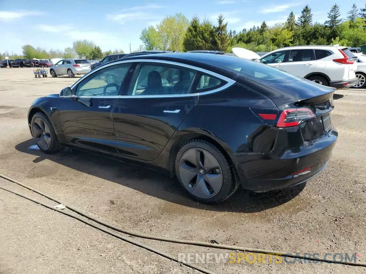 2 fotografías del automóvil dañado 5YJ3E1EAXKF403171 TESLA MODEL 3 2019