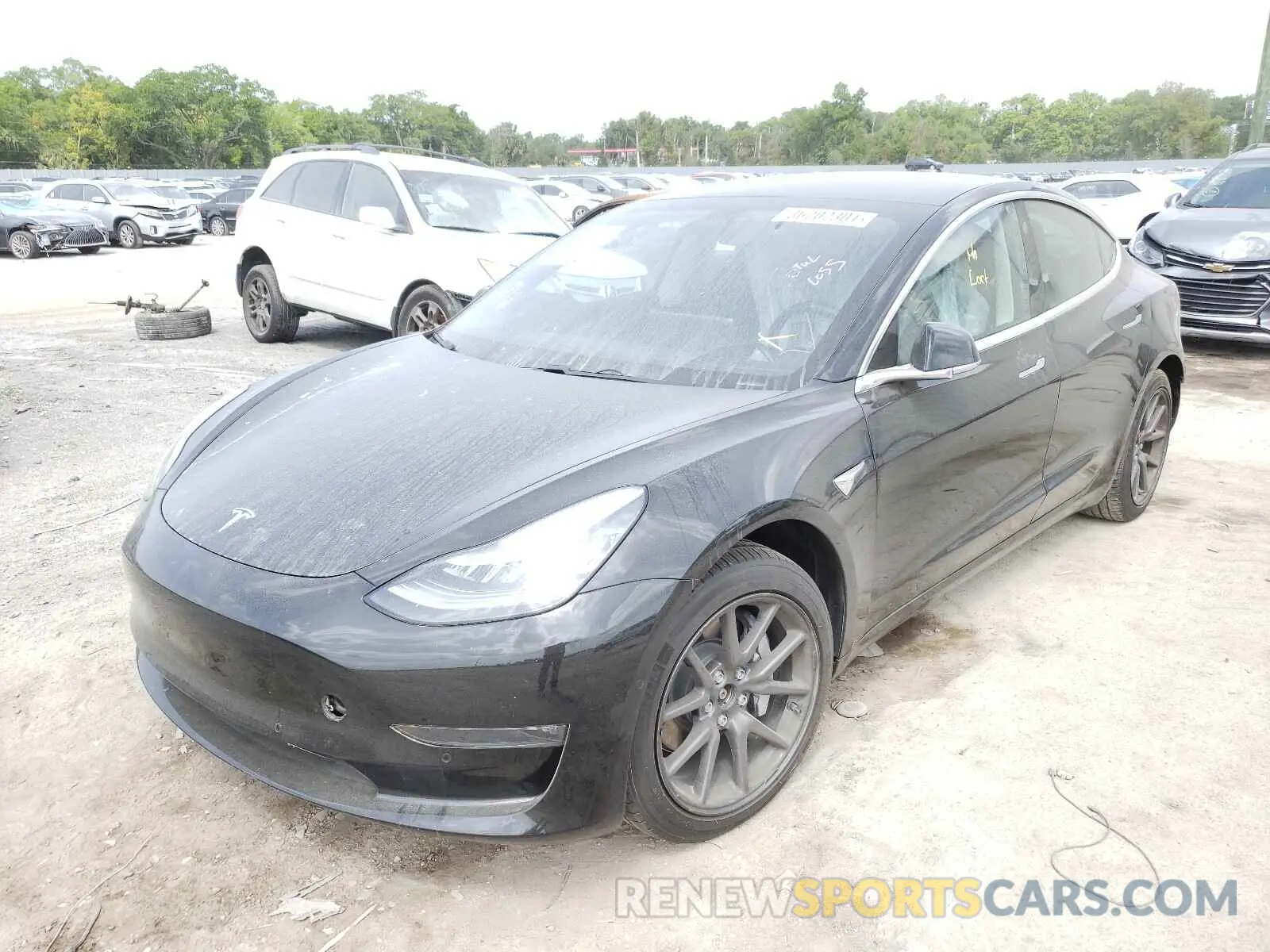 2 fotografías del automóvil dañado 5YJ3E1EB0KF197237 TESLA MODEL 3 2019