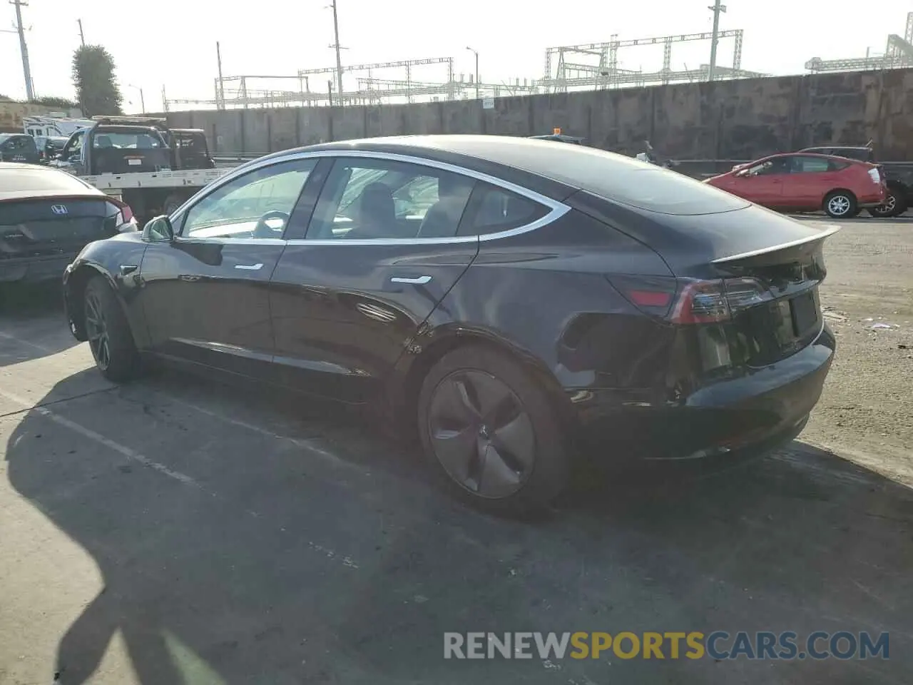 2 fotografías del automóvil dañado 5YJ3E1EB0KF385367 TESLA MODEL 3 2019